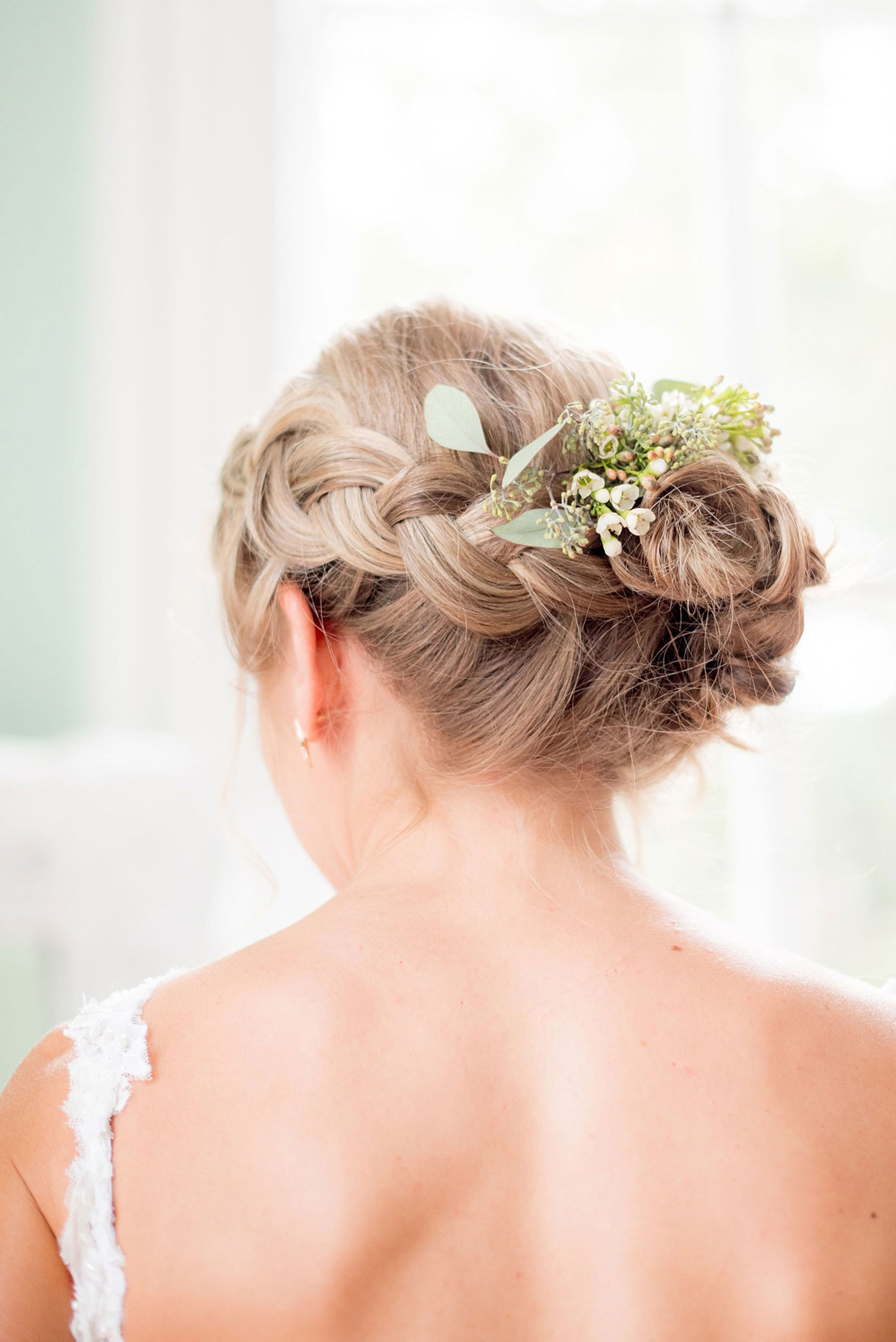 Mikkel Paige Photography wedding photos at The Merrimon-Wynne House in downtown Raleigh. The bride had a reverse braid crown up-do with eucalyptus and baby's breath in her hair.