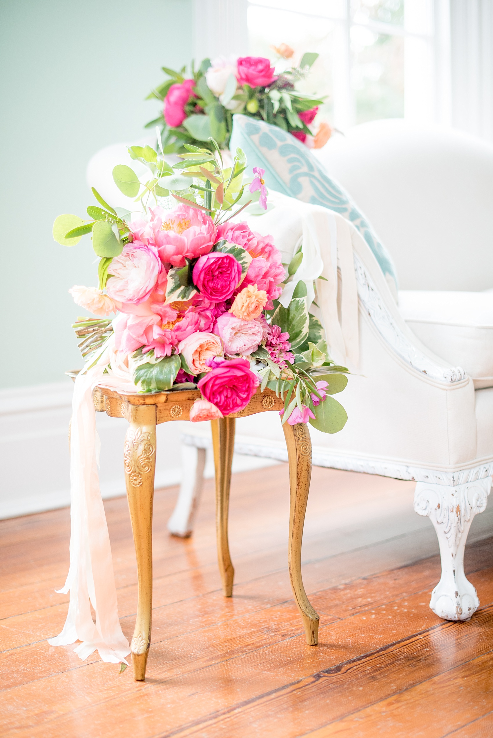 Mikkel Paige Photography wedding photos at The Merrimon-Wynne House in downtown Raleigh. Colorful pink, orange and green bouquets with peonies, eucalyptus and garden roses by Meristem Floral. 