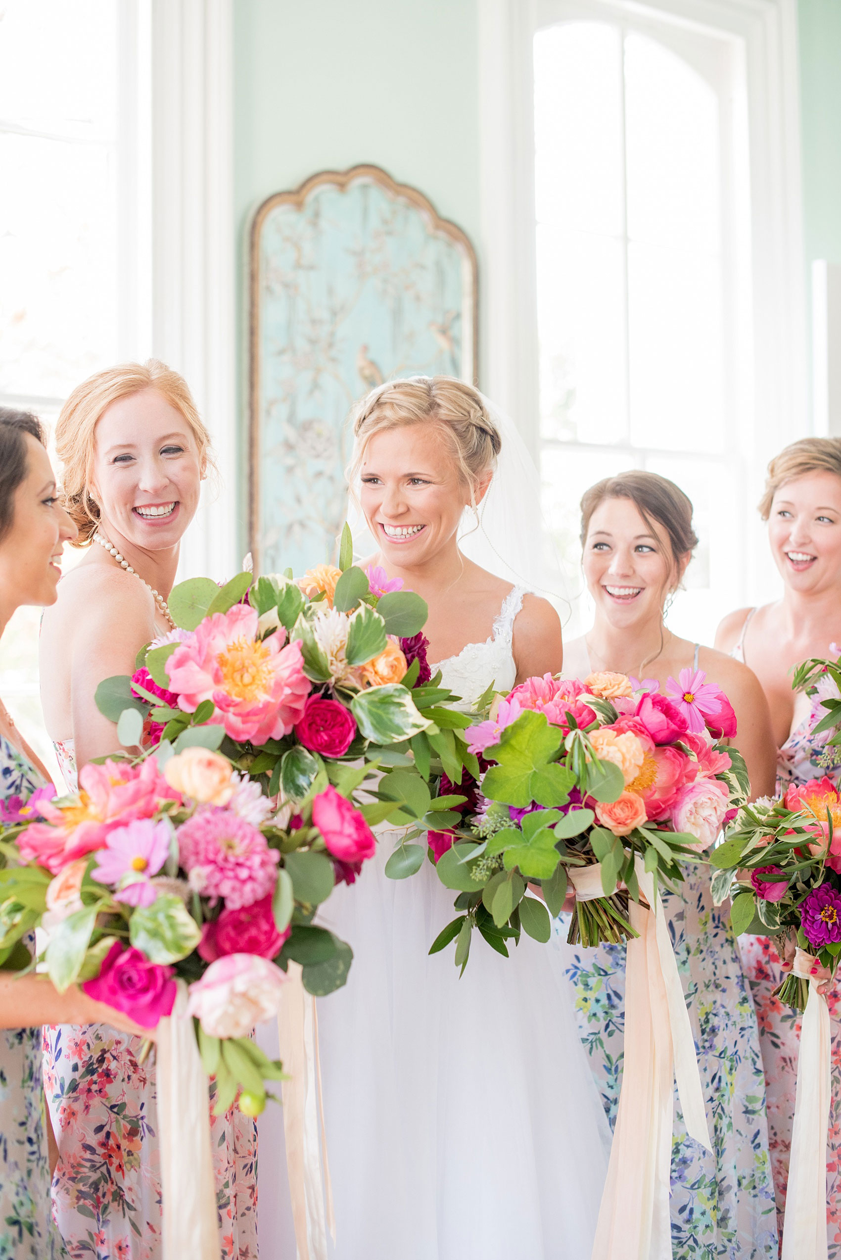 Mikkel Paige Photography wedding photos at The Merrimon-Wynne House in downtown Raleigh. Bridal party in floral maxi dresses in blue and pink and colorful garden rose and peony bouquets.