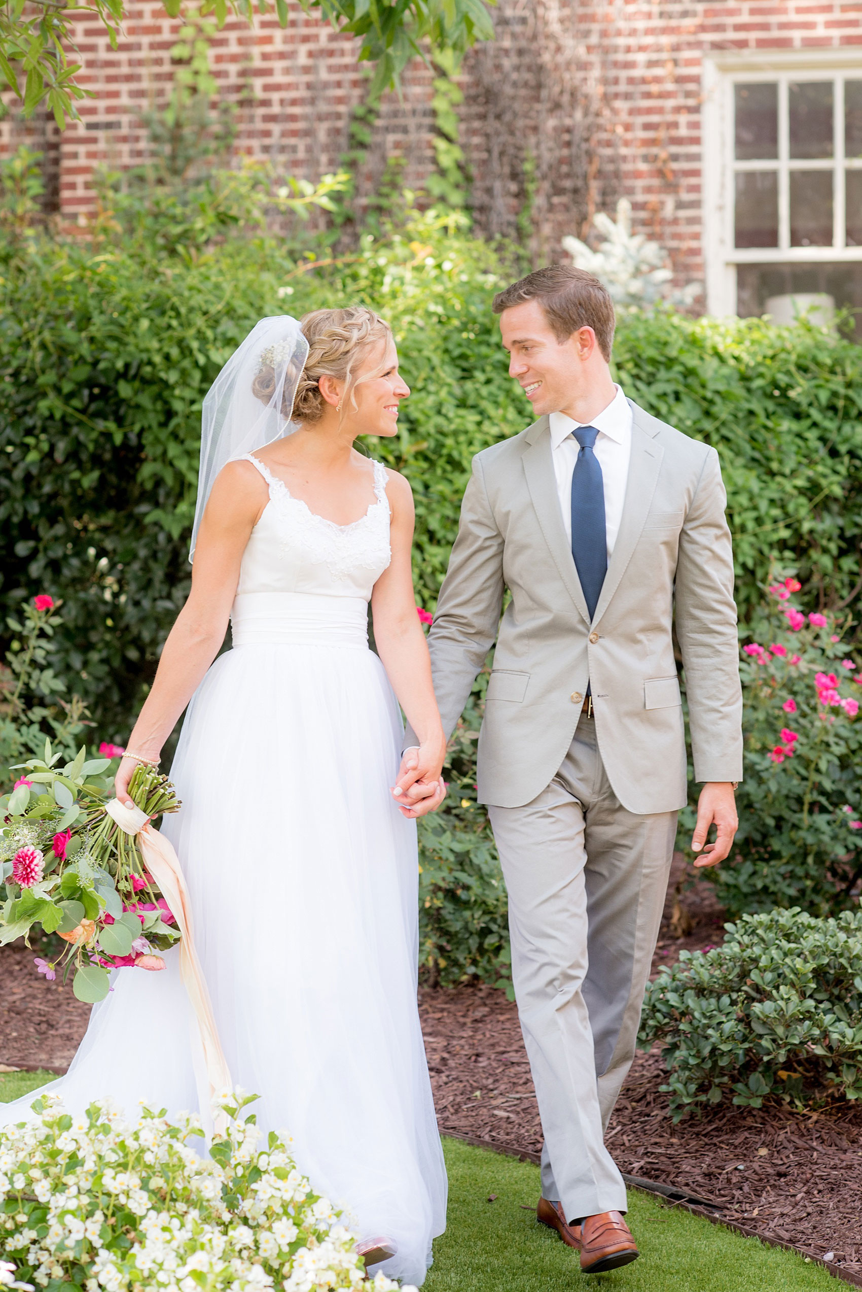 Mikkel Paige Photography wedding photos at The Merrimon-Wynne House in downtown Raleigh. The bride and groom with colorful bouquet and tulle skirt wedding dress.