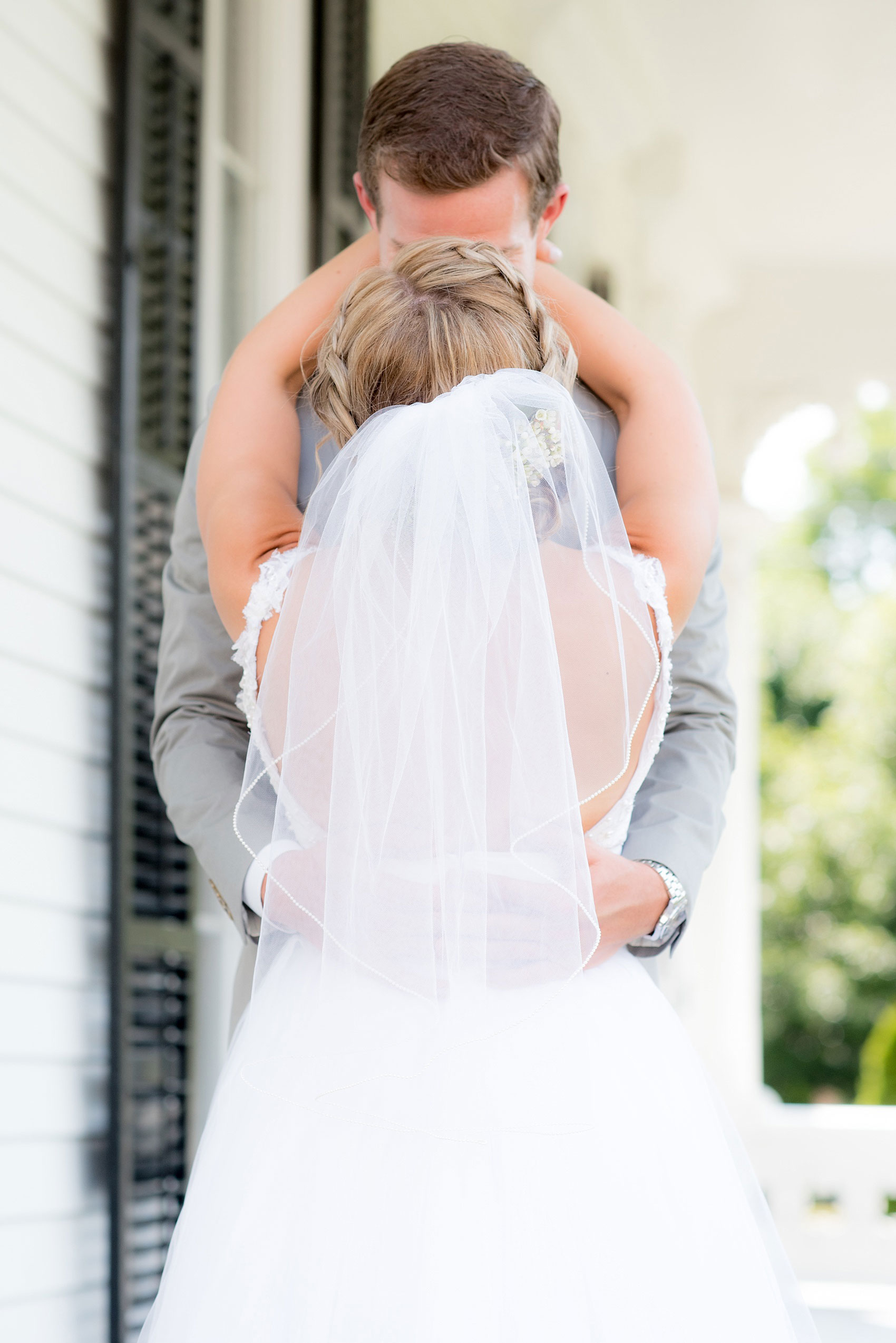 Mikkel Paige Photography wedding photos at The Merrimon-Wynne House in downtown Raleigh. The bride and groom with colorful bouquet and tulle skirt wedding dress.