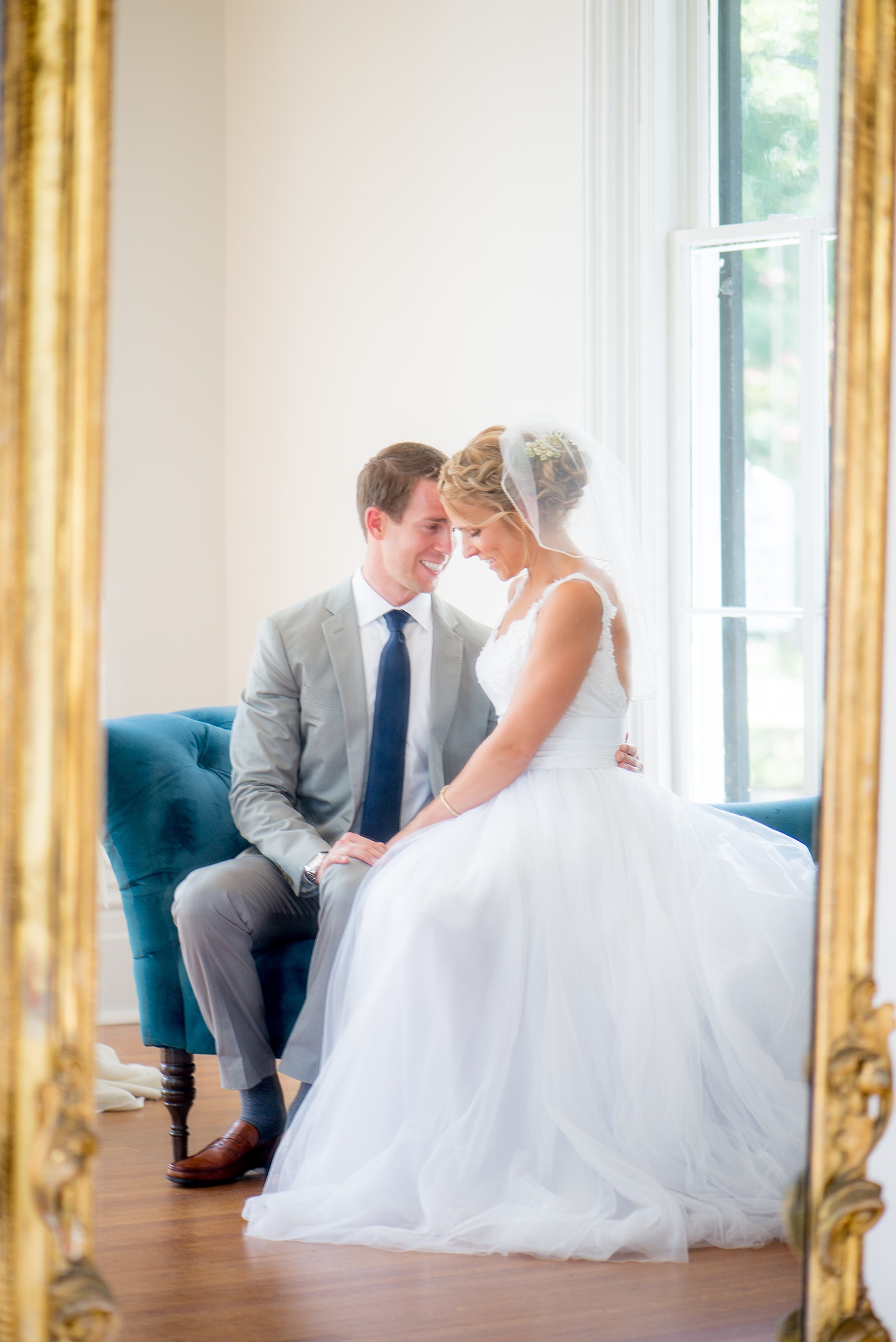 Mikkel Paige Photography wedding photos at The Merrimon-Wynne House in downtown Raleigh. The bride and groom with colorful bouquet and tulle skirt wedding dress.