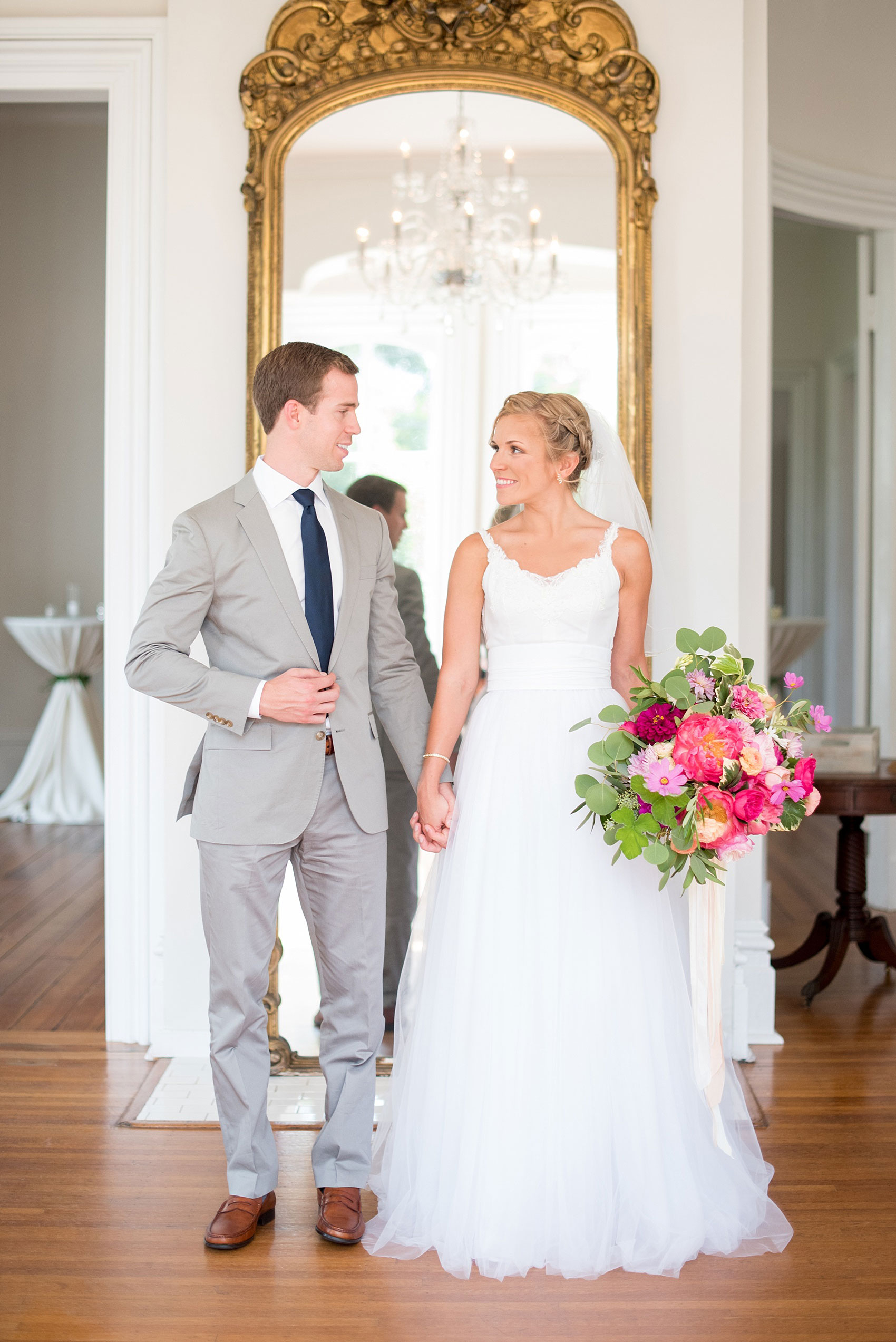 Mikkel Paige Photography wedding photos at The Merrimon-Wynne House in downtown Raleigh. The bride and groom with colorful bouquet and tulle skirt wedding dress.