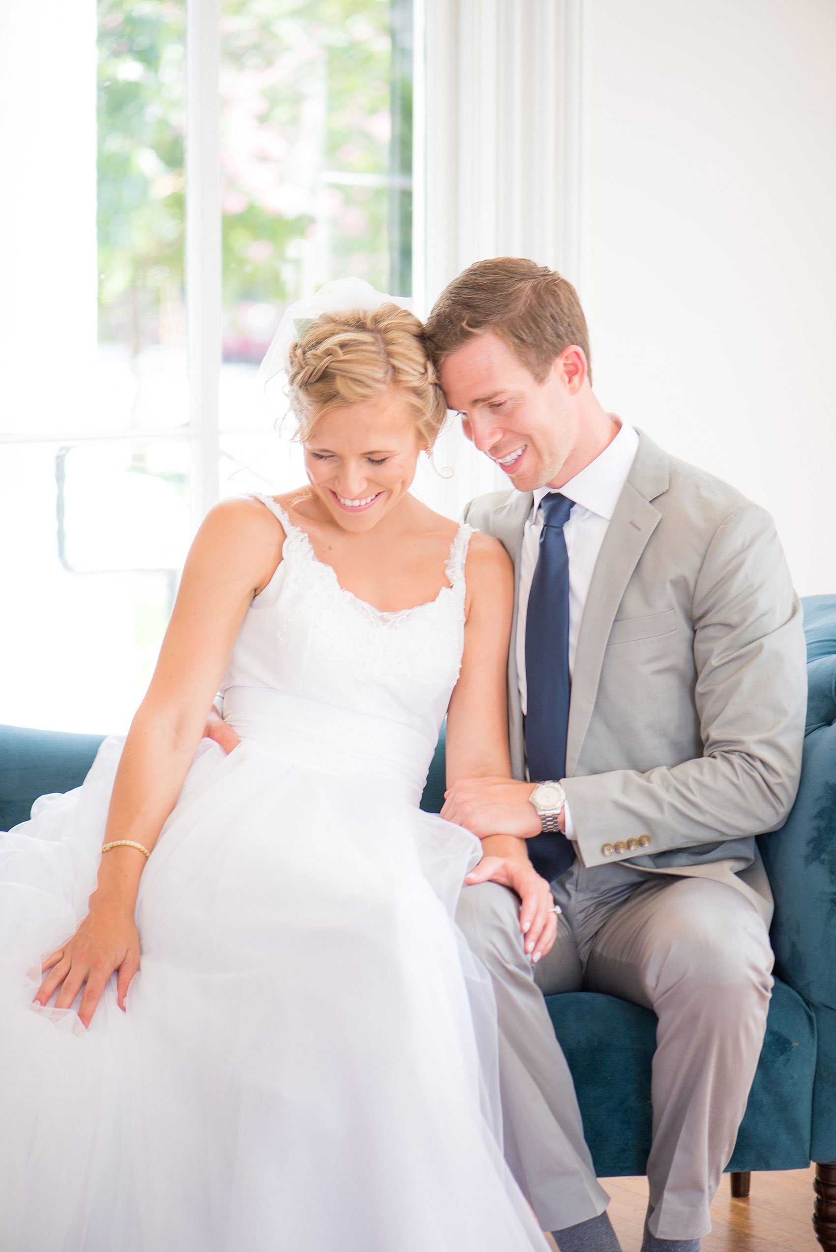 Mikkel Paige Photography wedding photos at The Merrimon-Wynne House in downtown Raleigh. The bride and groom with colorful bouquet and tulle skirt wedding dress.