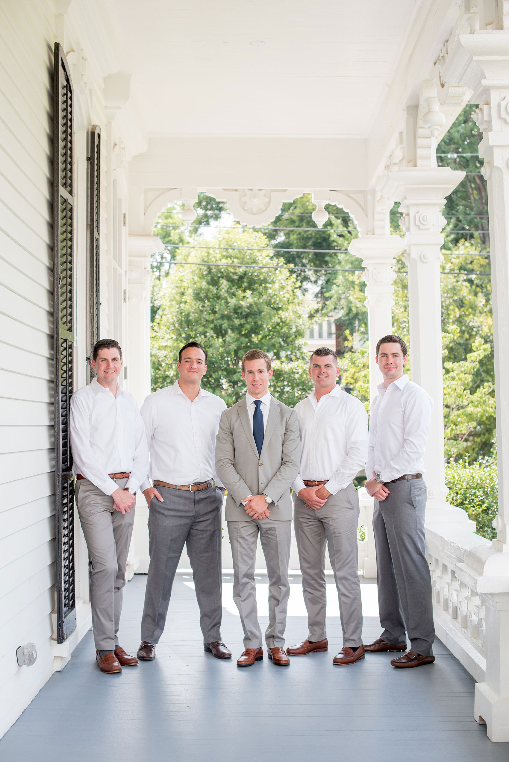 Mikkel Paige Photography wedding photos at The Merrimon-Wynne House in downtown Raleigh. The groom and his groomsmen in unique outfits - no tie and no jacket - for a summer wedding in the south.