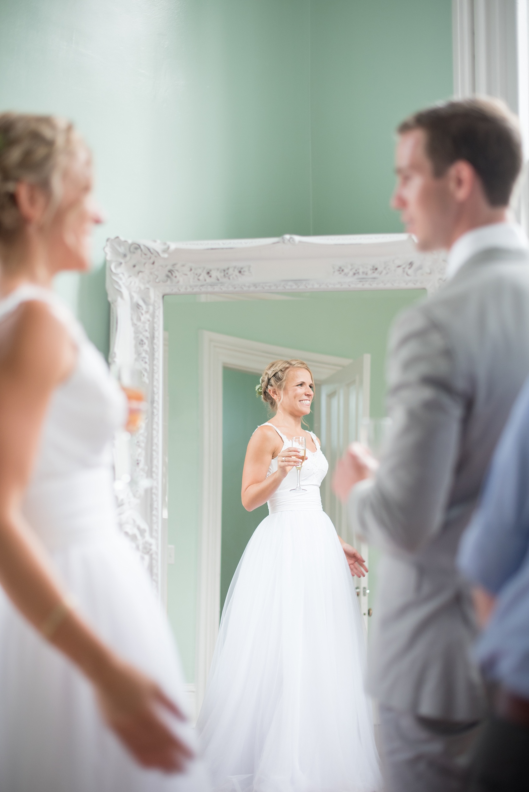 Mikkel Paige Photography wedding photos at The Merrimon-Wynne House in downtown Raleigh. The bride and groom toast to their marriage after their ceremony.