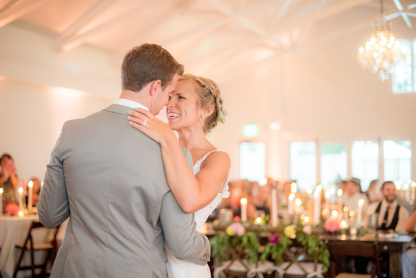 Mikkel Paige Photography wedding photos at The Merrimon-Wynne House in downtown Raleigh. A picture of the carriage house reception with the bride and groom's first dance.