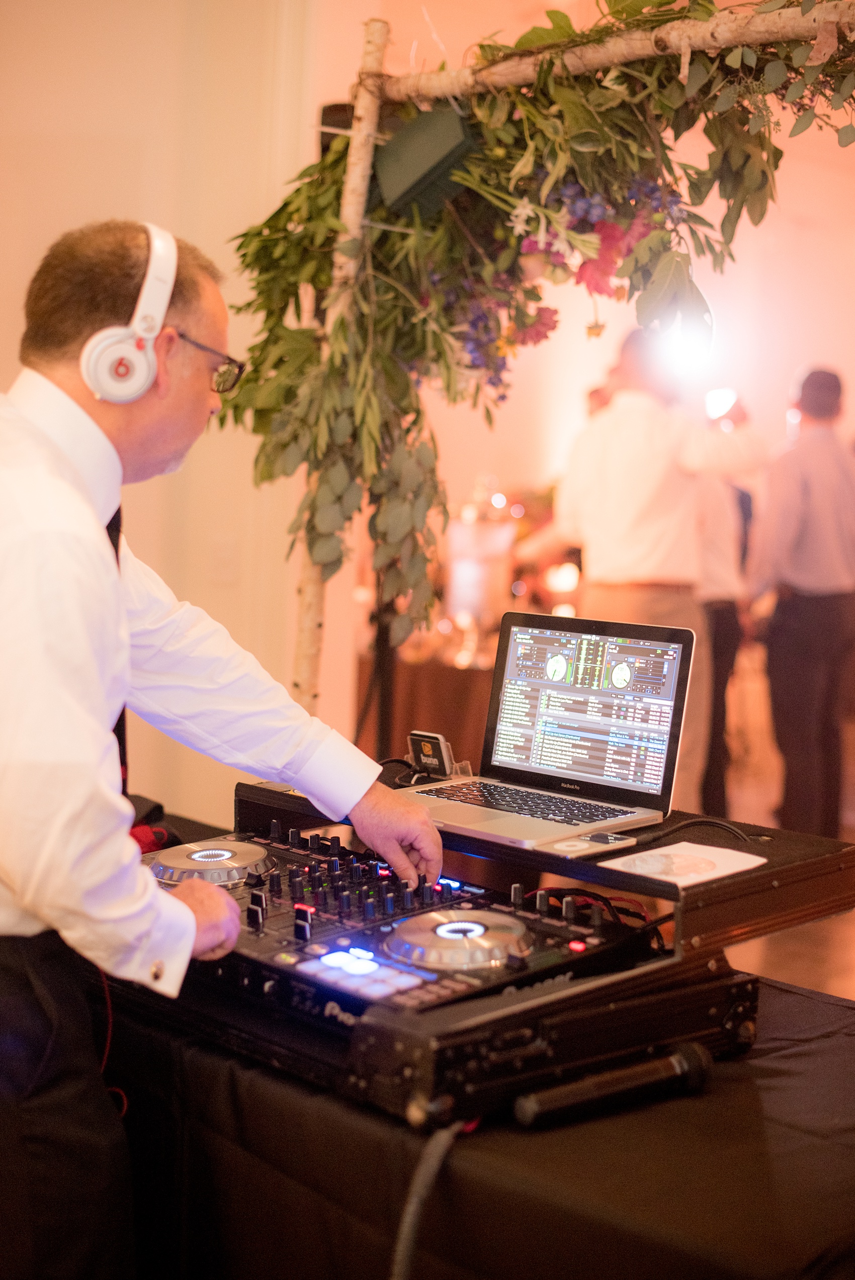 kkel Paige Photography wedding photos at The Merrimon-Wynne House in downtown Raleigh. A picture of Randy from Bunn DJ Company DJing the evening.