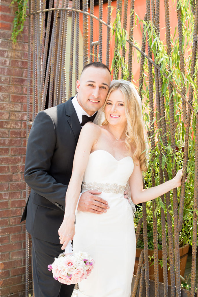 Mikkel Paige Photography photo of the bride and groom in front of their wedding at My Moon Brooklyn.