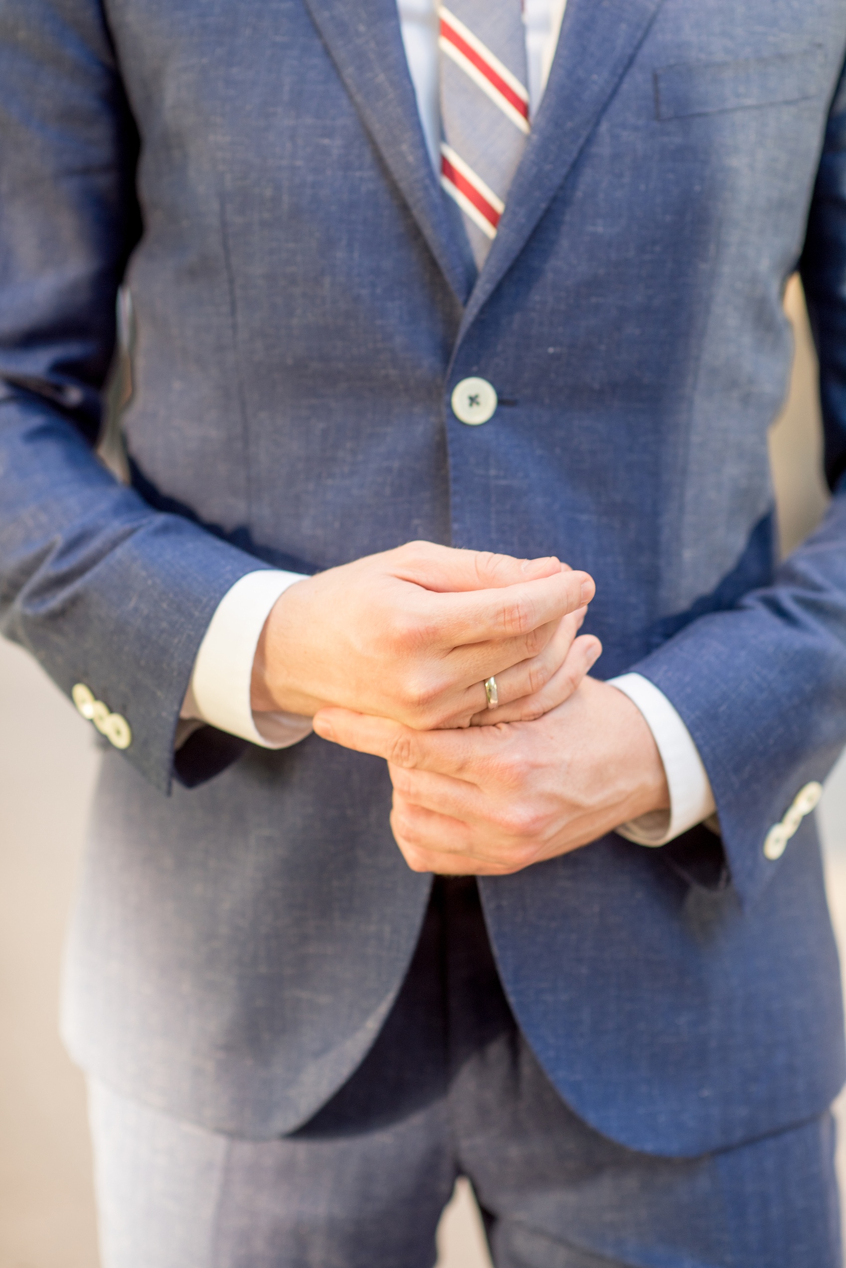 Mikkel Paige Photography photos of a same sex, gay engagement session in lower Manhattan's financial district with the grooms in custom suits.