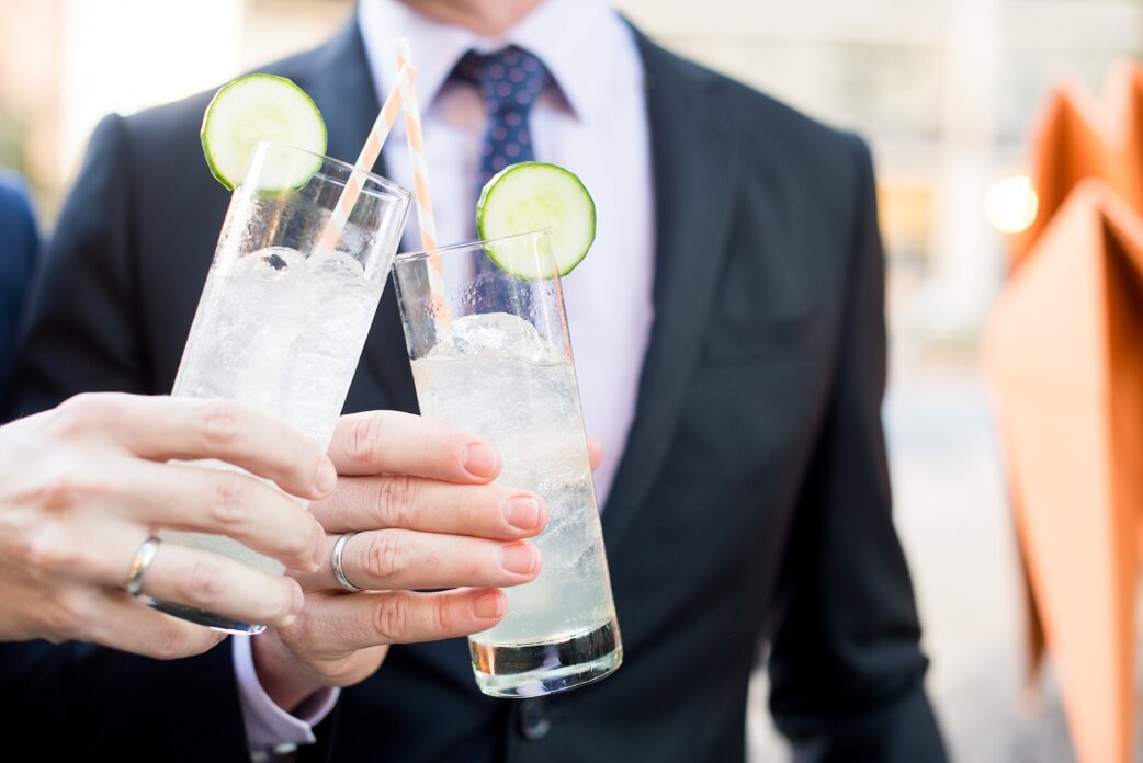 Mikkel Paige Photography photos of a same sex, gay engagement session in lower Manhattan's financial district with the grooms in custom suits.