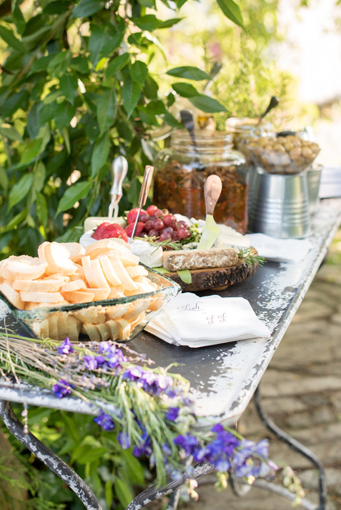 Mikkel Paige Photography photo of a rustic chic farm wedding at Spring Hill Manor, Maryland. Outdoor cocktail hour with custom bride and groom napkins.