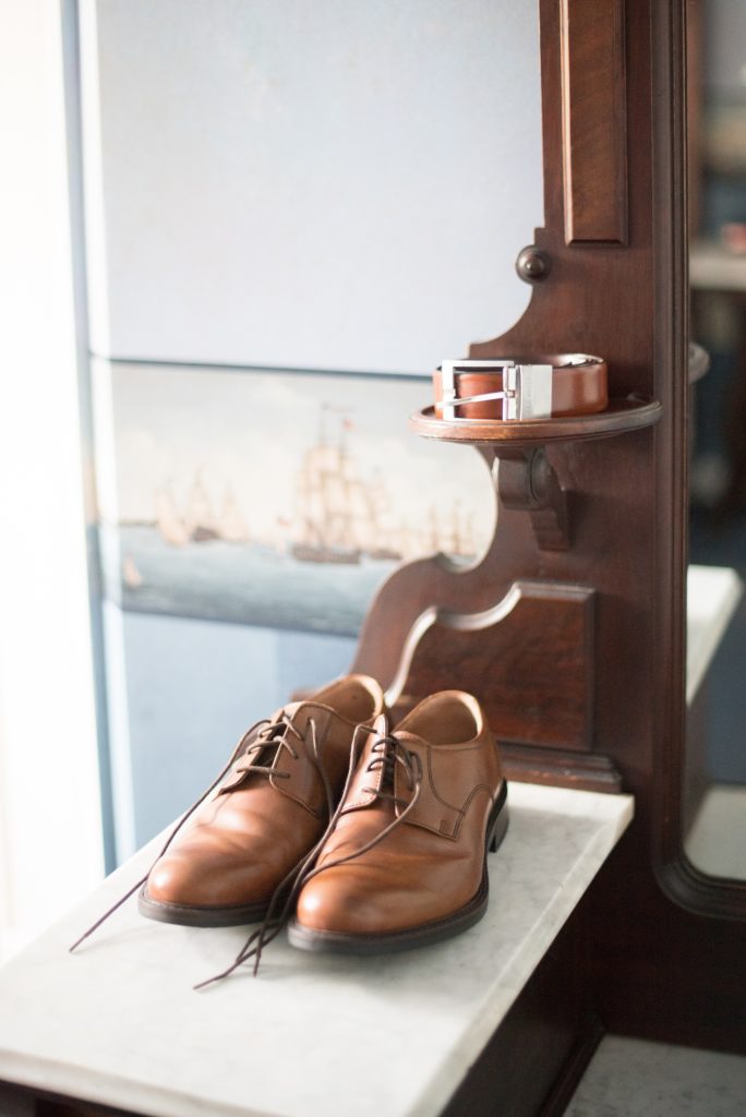 Mikkel Paige Photography photos of a wedding at Spring Hill Manor in Maryland. Detail photo of the groom's shoes and belt.