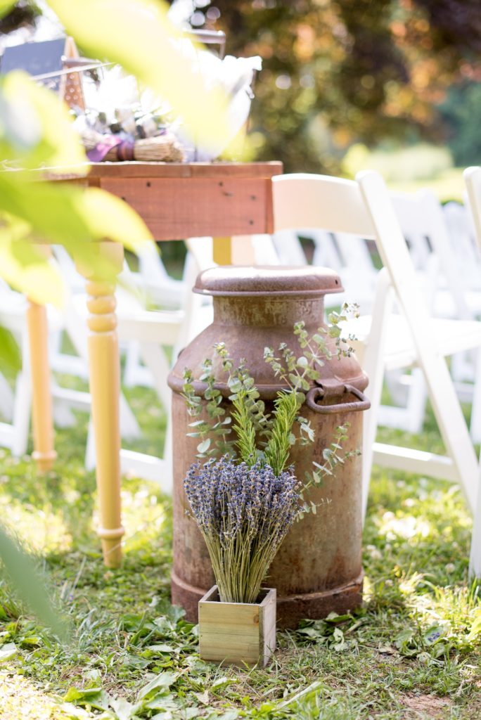 Mikkel Paige Photography photos of a wedding at Spring Hill Manor in Maryland. Photo of the ceremony setup with lavender and eucalyptus detail.