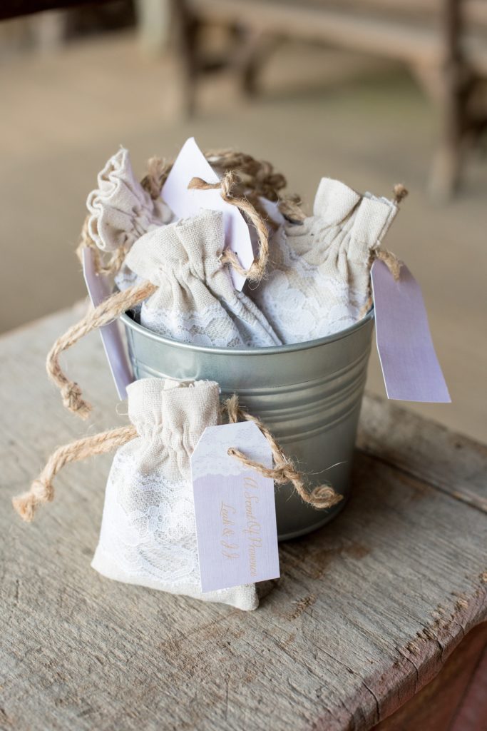 Mikkel Paige Photography photos of a wedding at Spring Hill Manor in Maryland. Image of the satchels for guest favors filled with lavender.