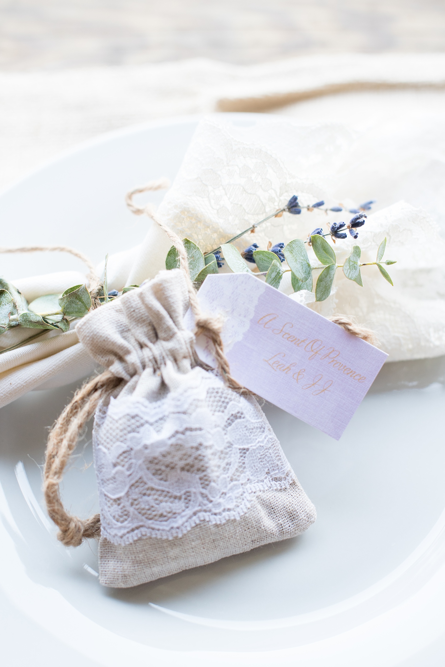 Mikkel Paige Photography photos of a wedding at Spring Hill Manor in Maryland. Image of the satchels for guest favors filled with lavender.