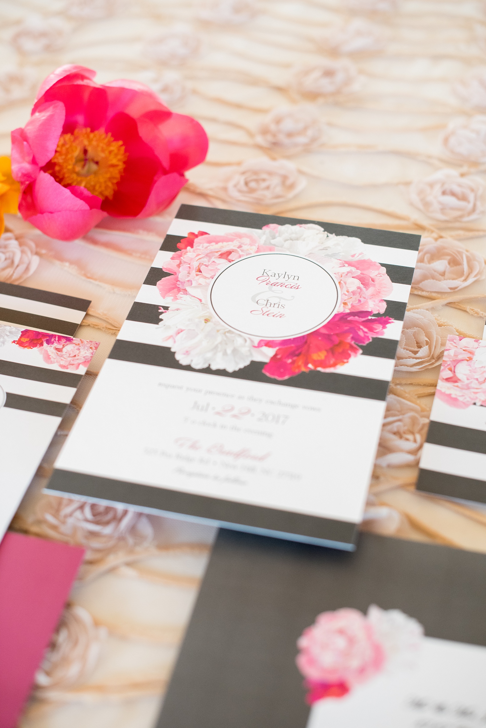 Mikkel Paige Photography wedding photo at The Bradford, NC. Modern pink, black and white striped invitation set.