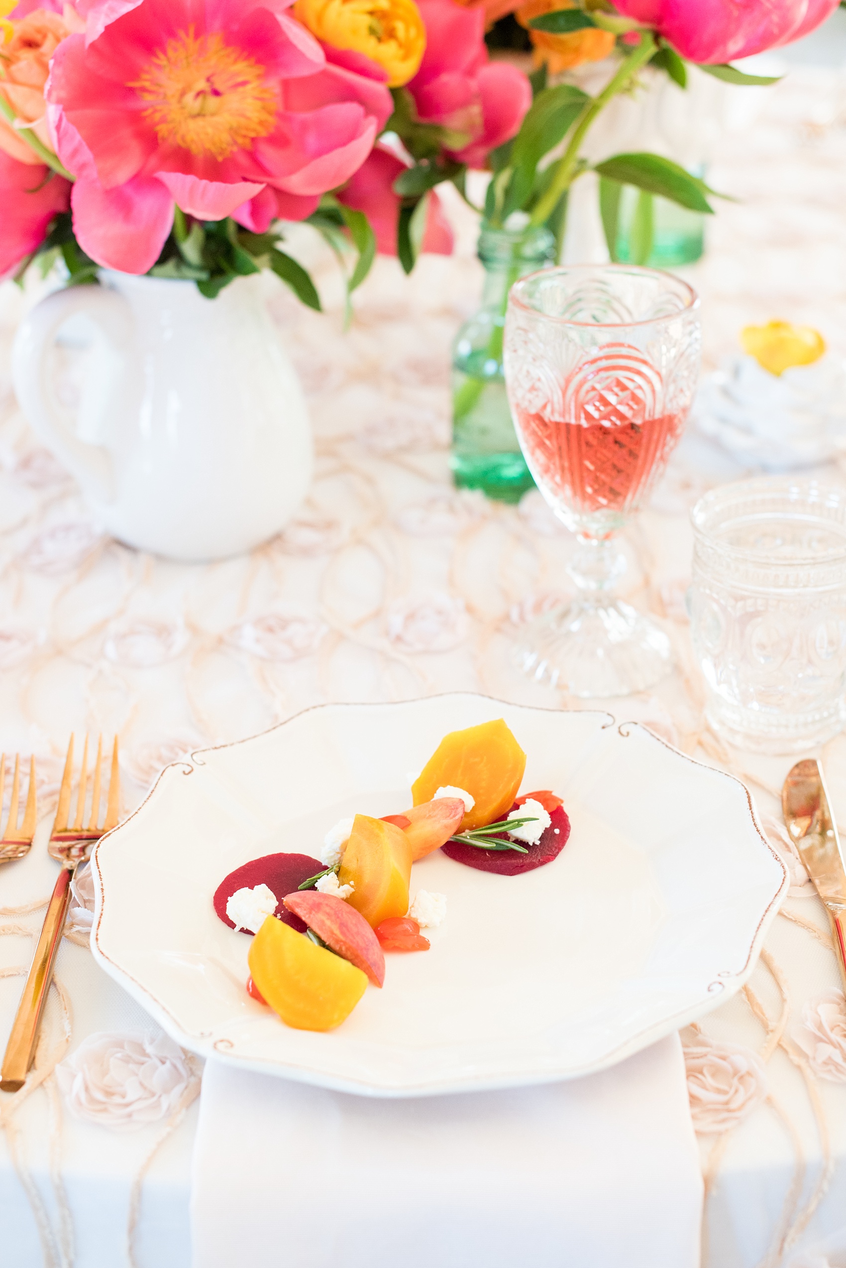 Mikkel Paige Photography wedding photo at The Bradford, NC. Plated summer salad with golden and classic beets by Belle's Catering.