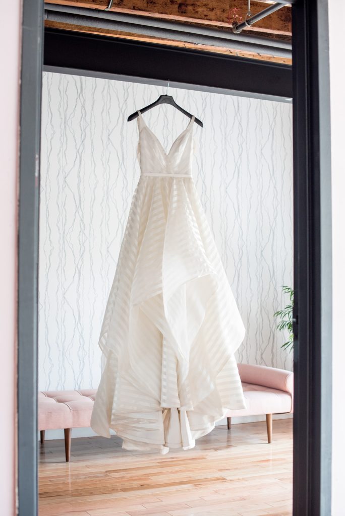 Mikkel Paige Photography photo of Dobbin St Brooklyn wedding. Striped bridal gown by Hayley Paige. Planning and coordination by Color Pop Events.