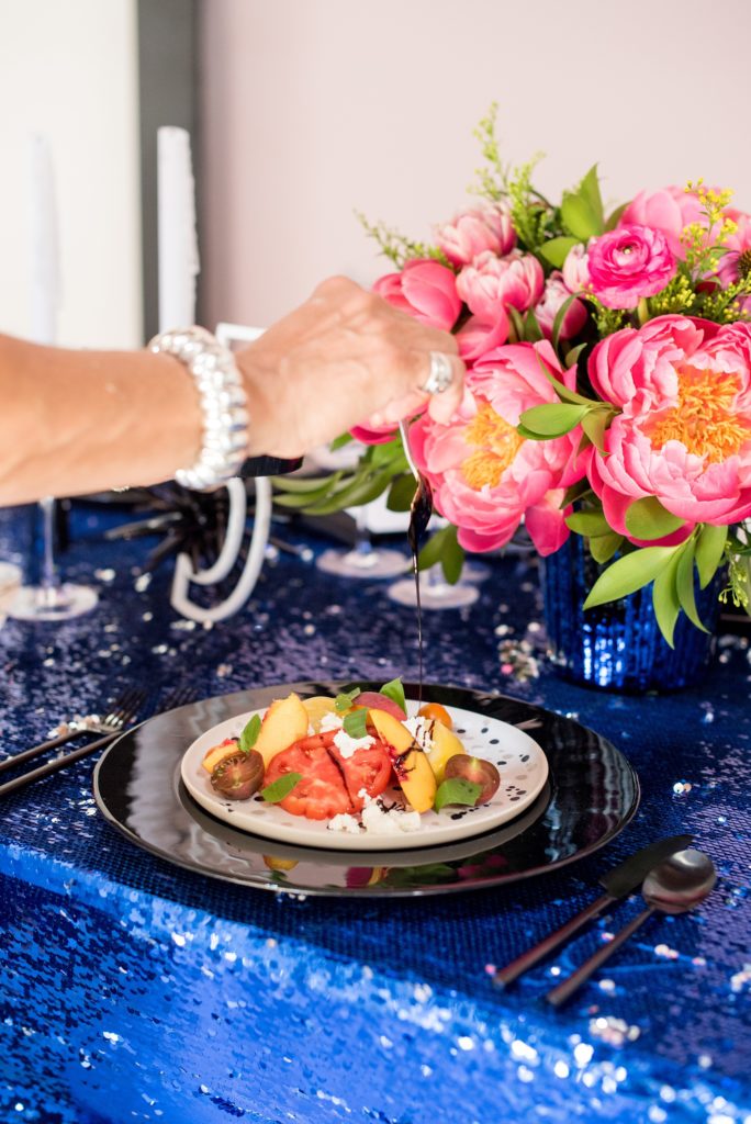 Mikkel Paige Photography photo of Dobbin St Brooklyn wedding. Planning and coordination by Color Pop Events. A tomato and balsamic salad by Ryan Brown Catering.