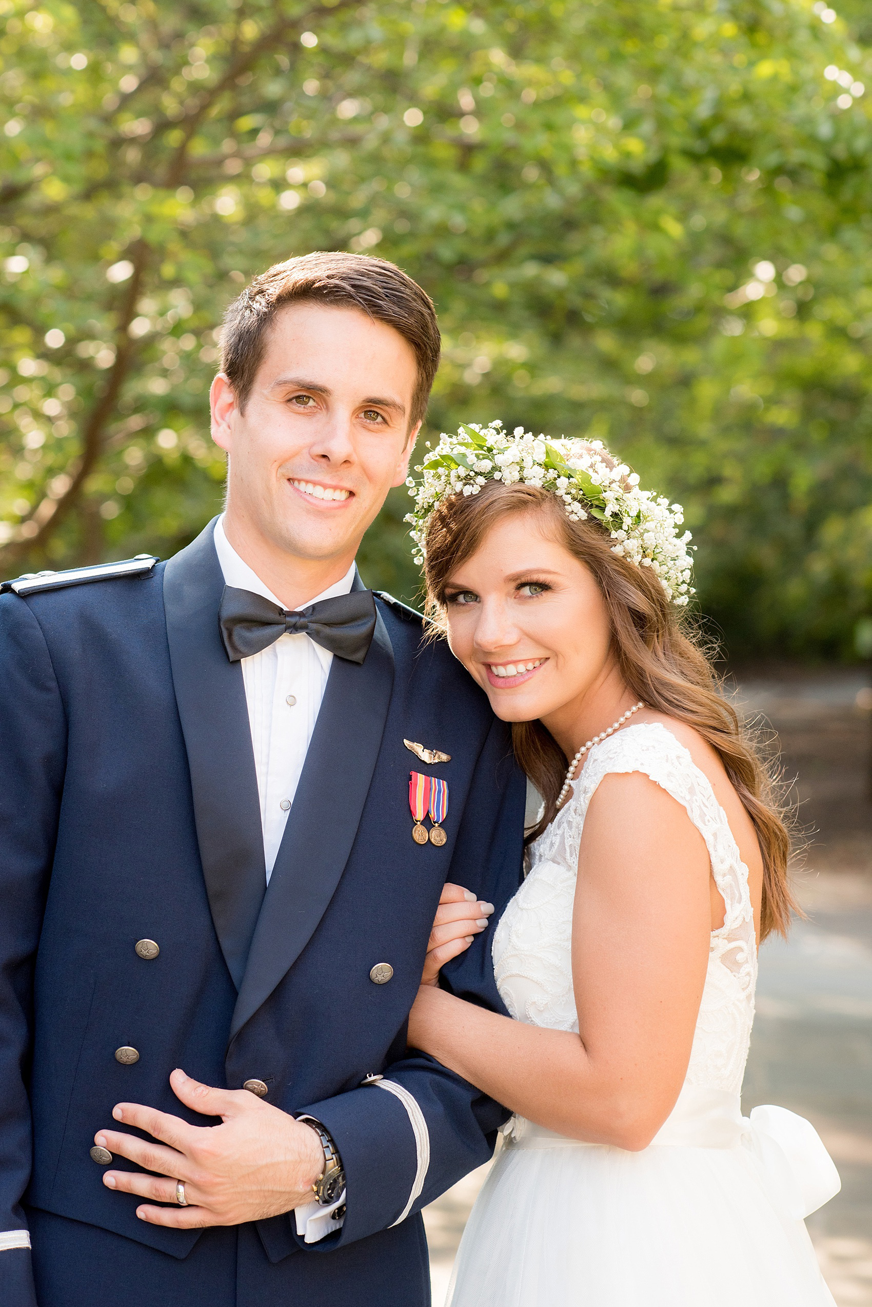 Mikkel Paige Photography photo of a Duke Chapel wedding with groom in Air Force uniform and bride in Baby's Breath flower crown.