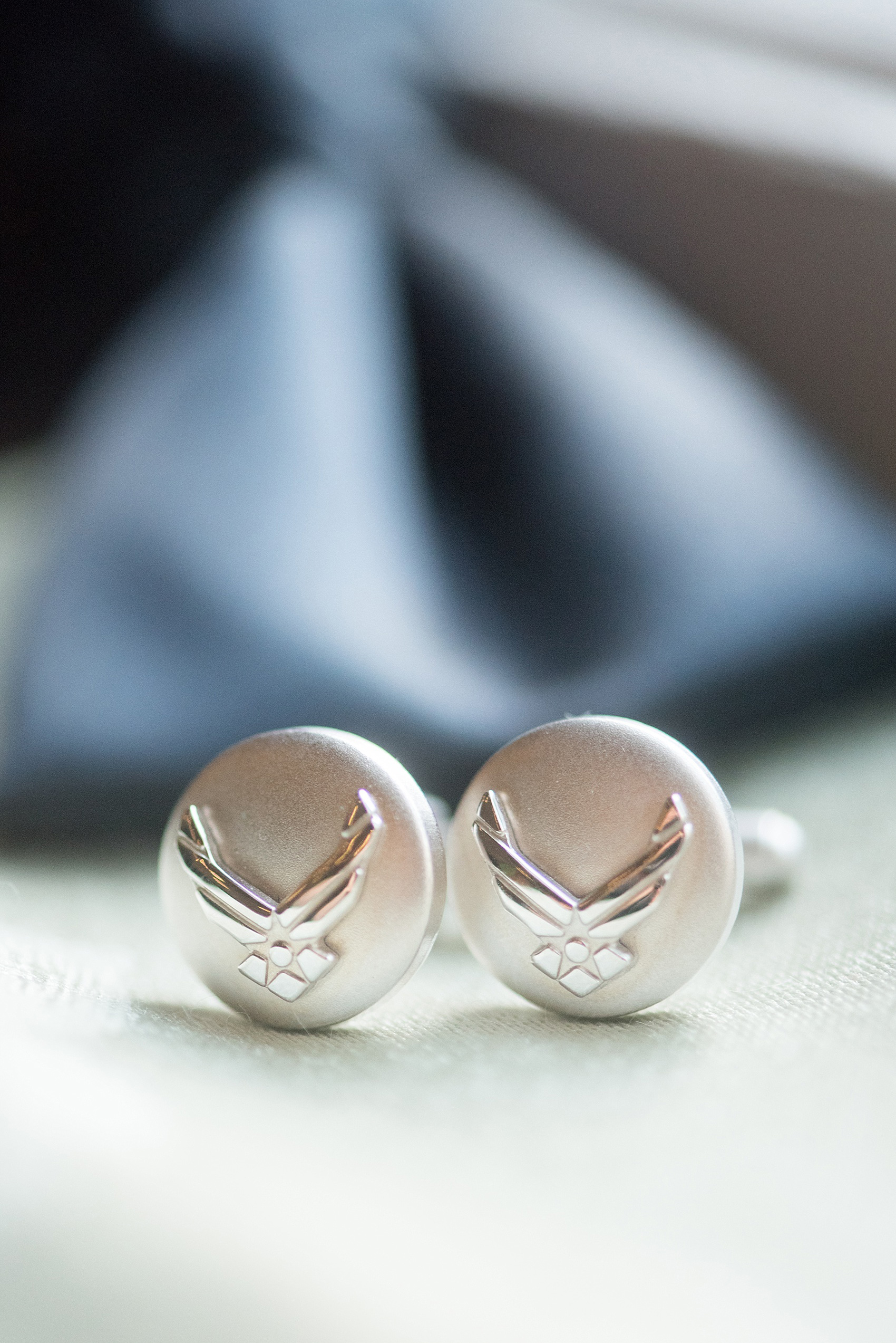 Mikkel Paige Photography photo of a Duke Chapel wedding in Durham, North Carolina. The groom's silver Air Force cufflinks.