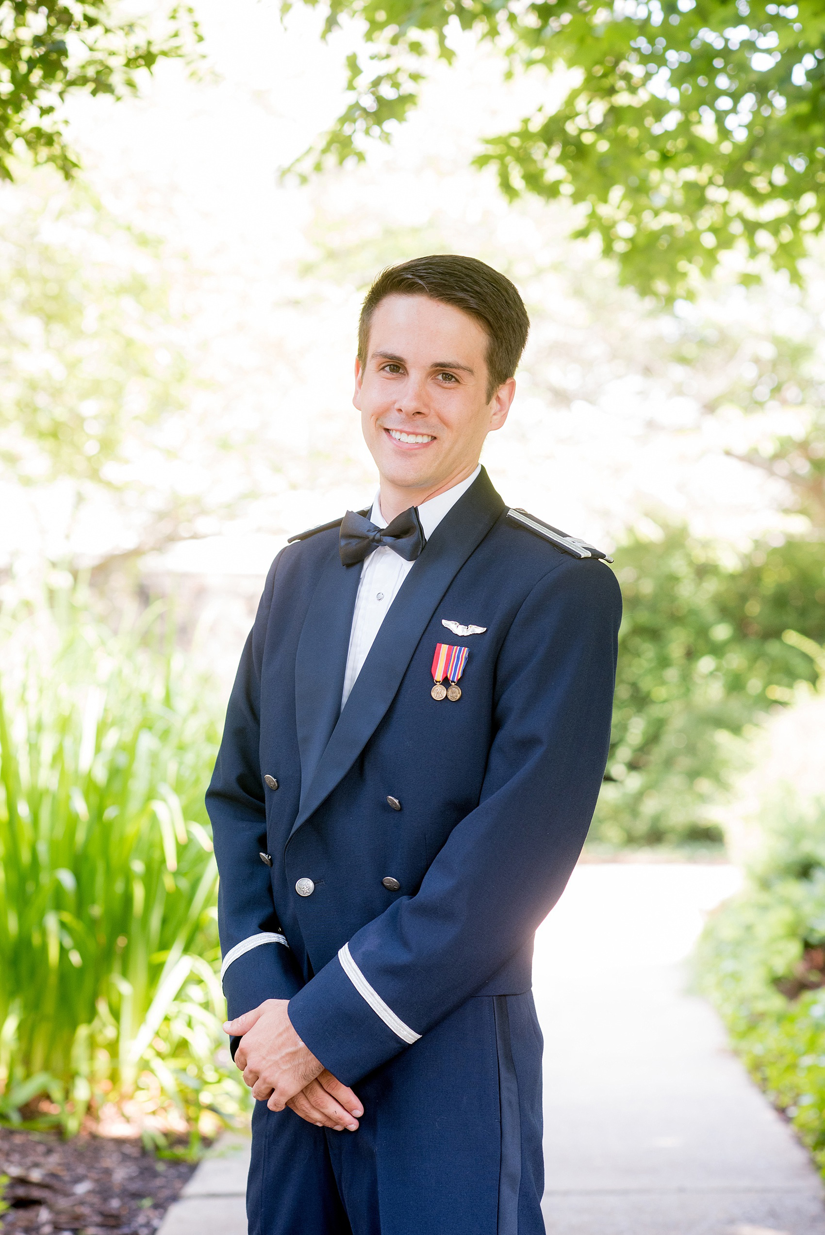 Mikkel Paige Photography photo of a Duke Chapel wedding in Durham, North Carolina. The groom wore his navy blue Air Force uniform.