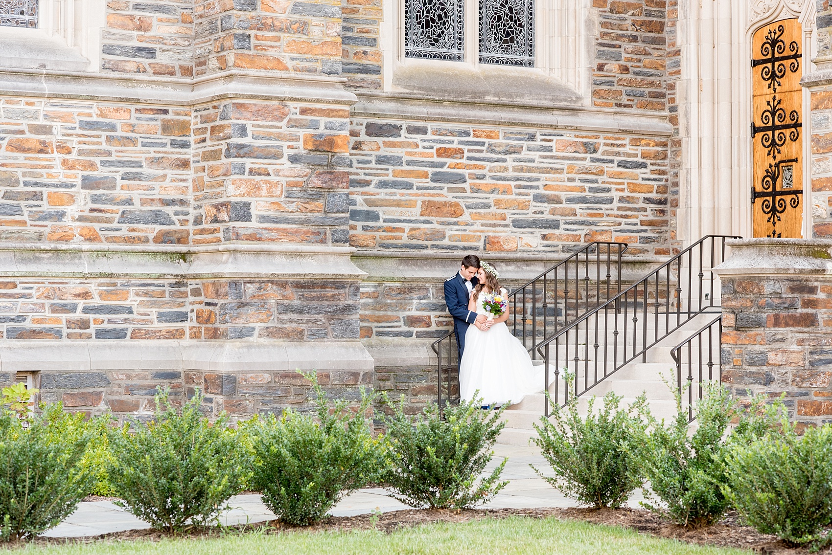 Mikkel Paige Photography photo of a Duke Chapel wedding in Durham, North Carolina. The bride and groom in front of the iconic gothic church.