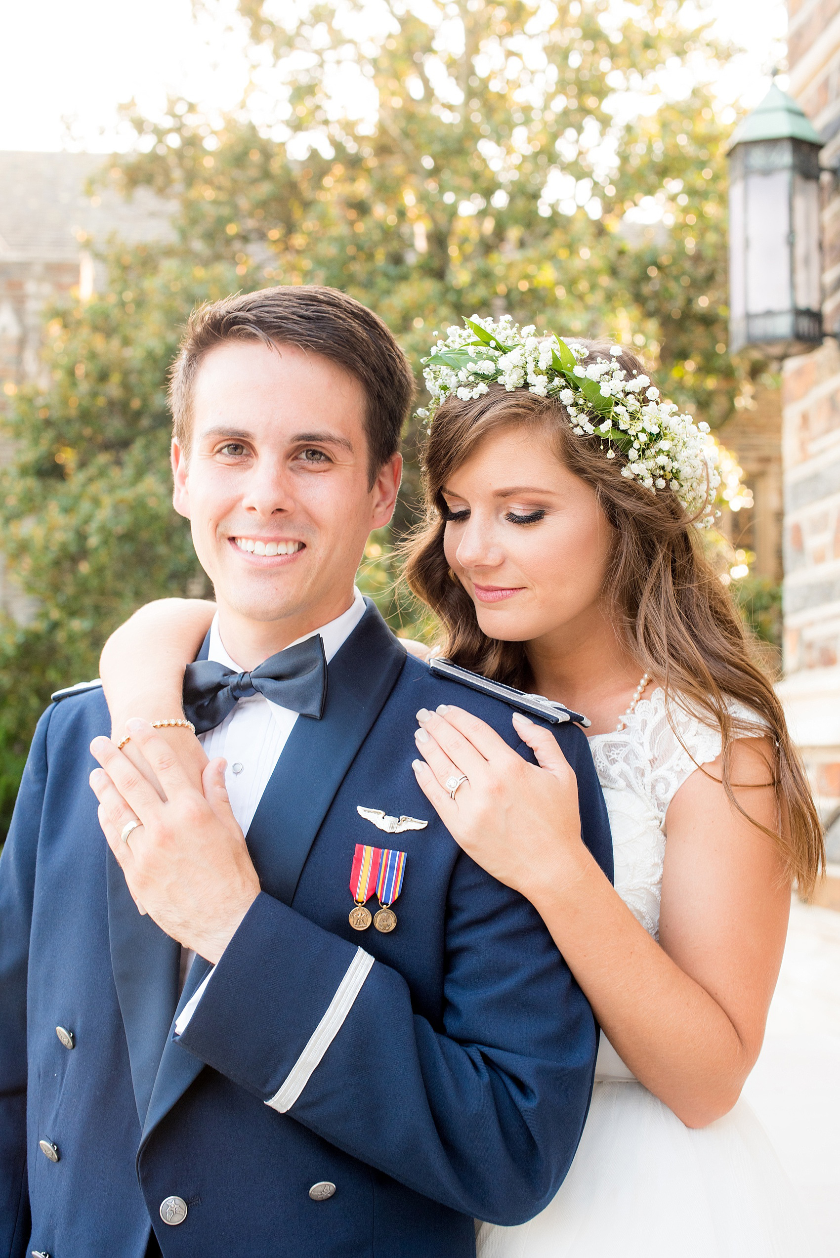 Mikkel Paige Photography photo of a Duke Chapel wedding in Durham, North Carolina. The bride in her Baby's Breath floral crown and groom in his navy blue Air Force uniform.