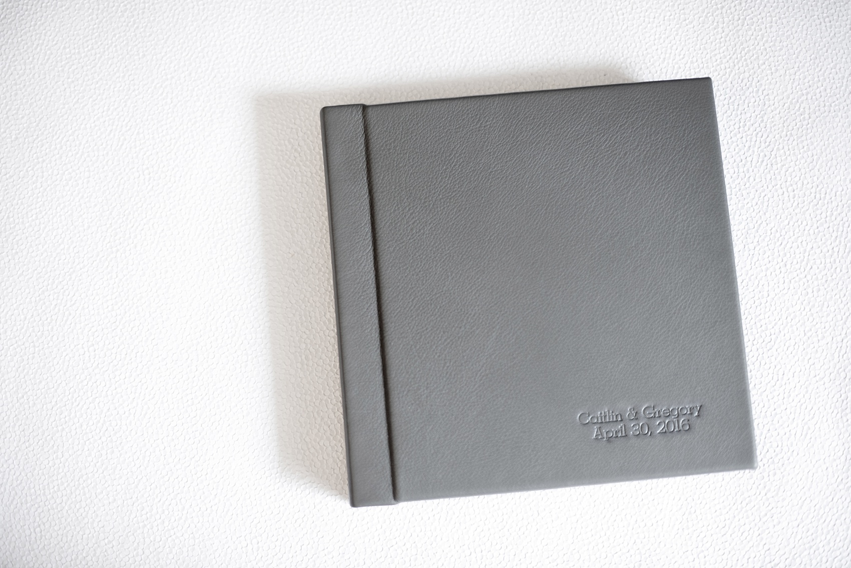 Mikkel Paige Photography grey leather wedding album book from The Harbor Club at Prime on Long Island.