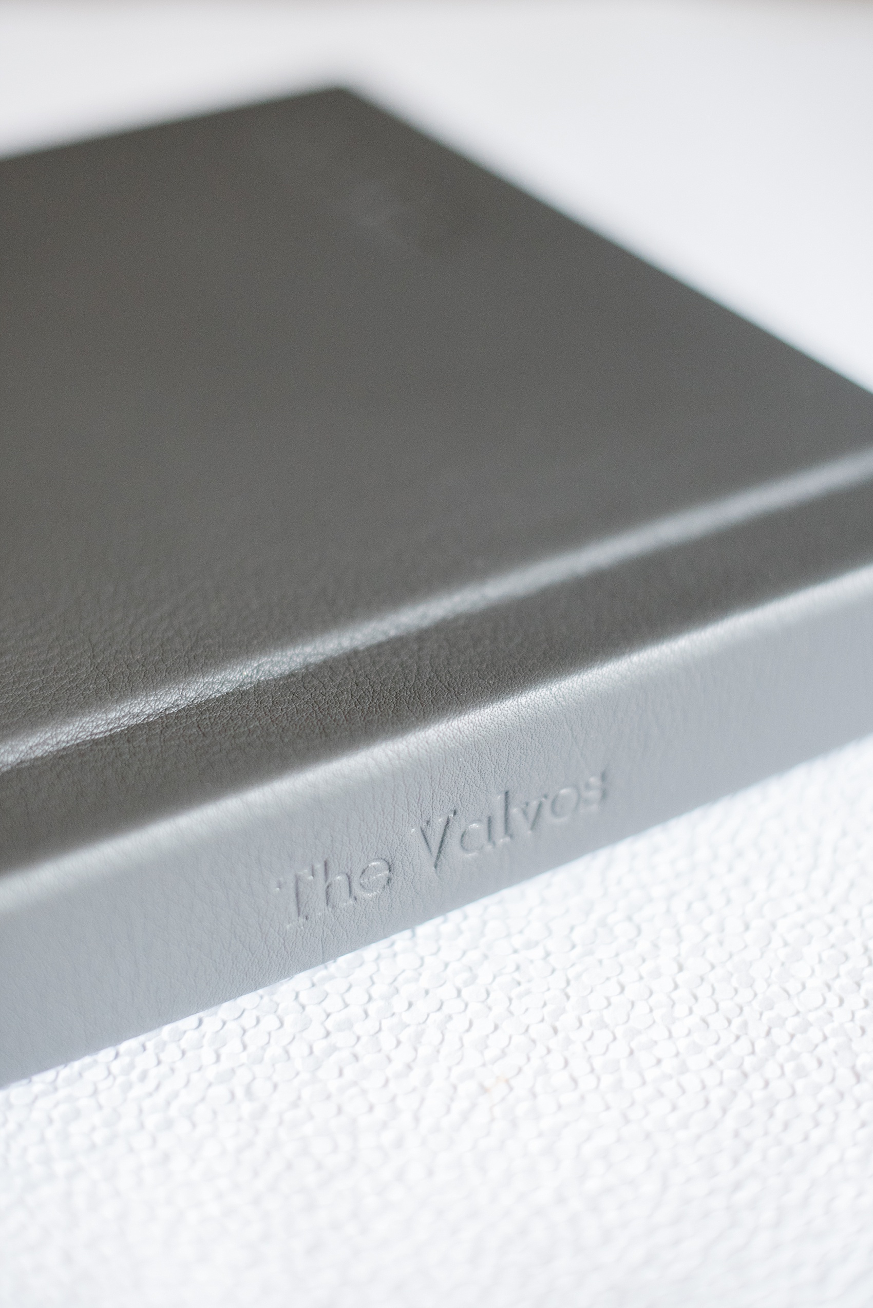 Mikkel Paige Photography grey leather wedding album book from The Harbor Club at Prime on Long Island.