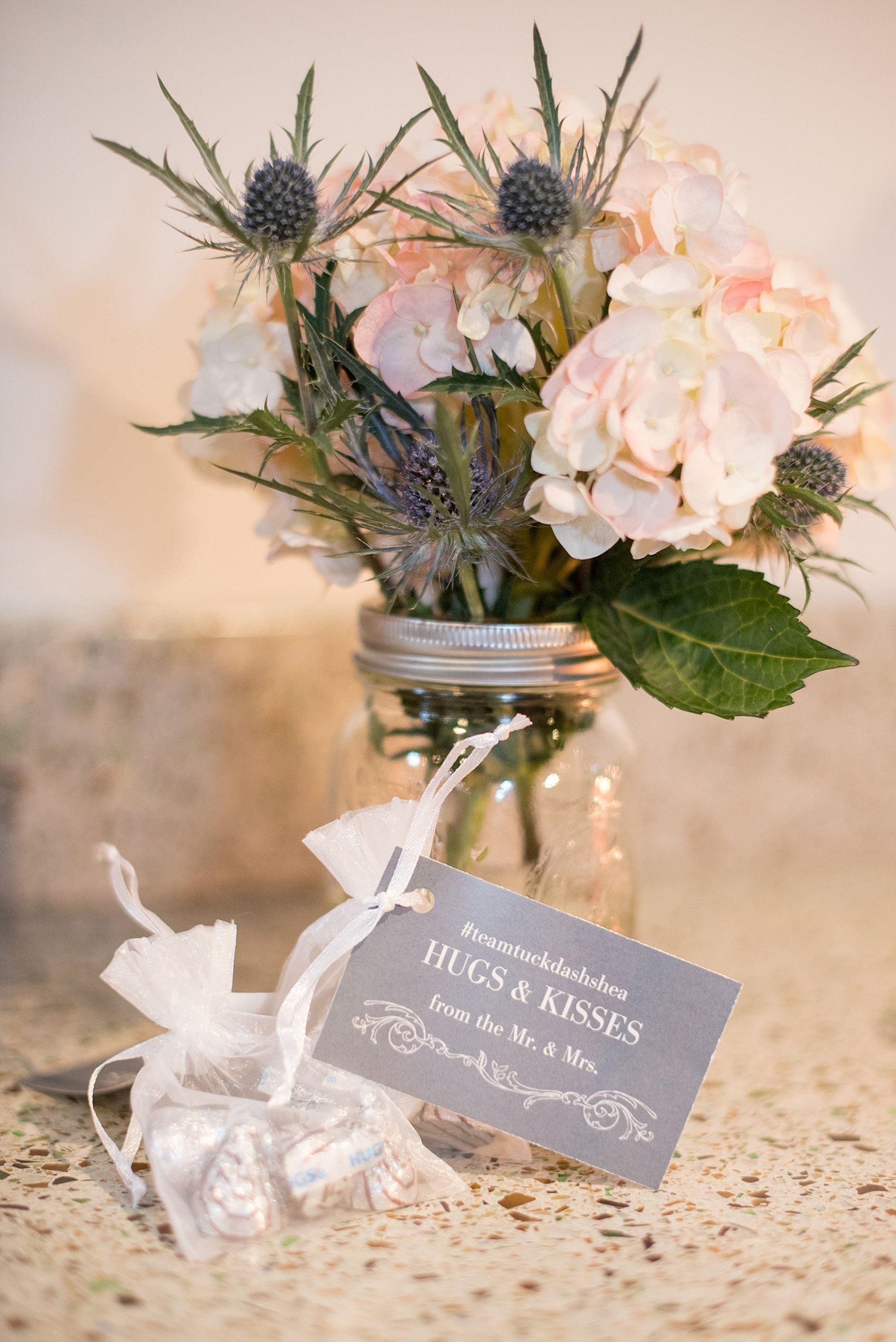 Mikkel Paige Photography photo of the wedding guest favor "Hugs and Kisses" at a Top of the Hill reception in Chapel Hill, NC.