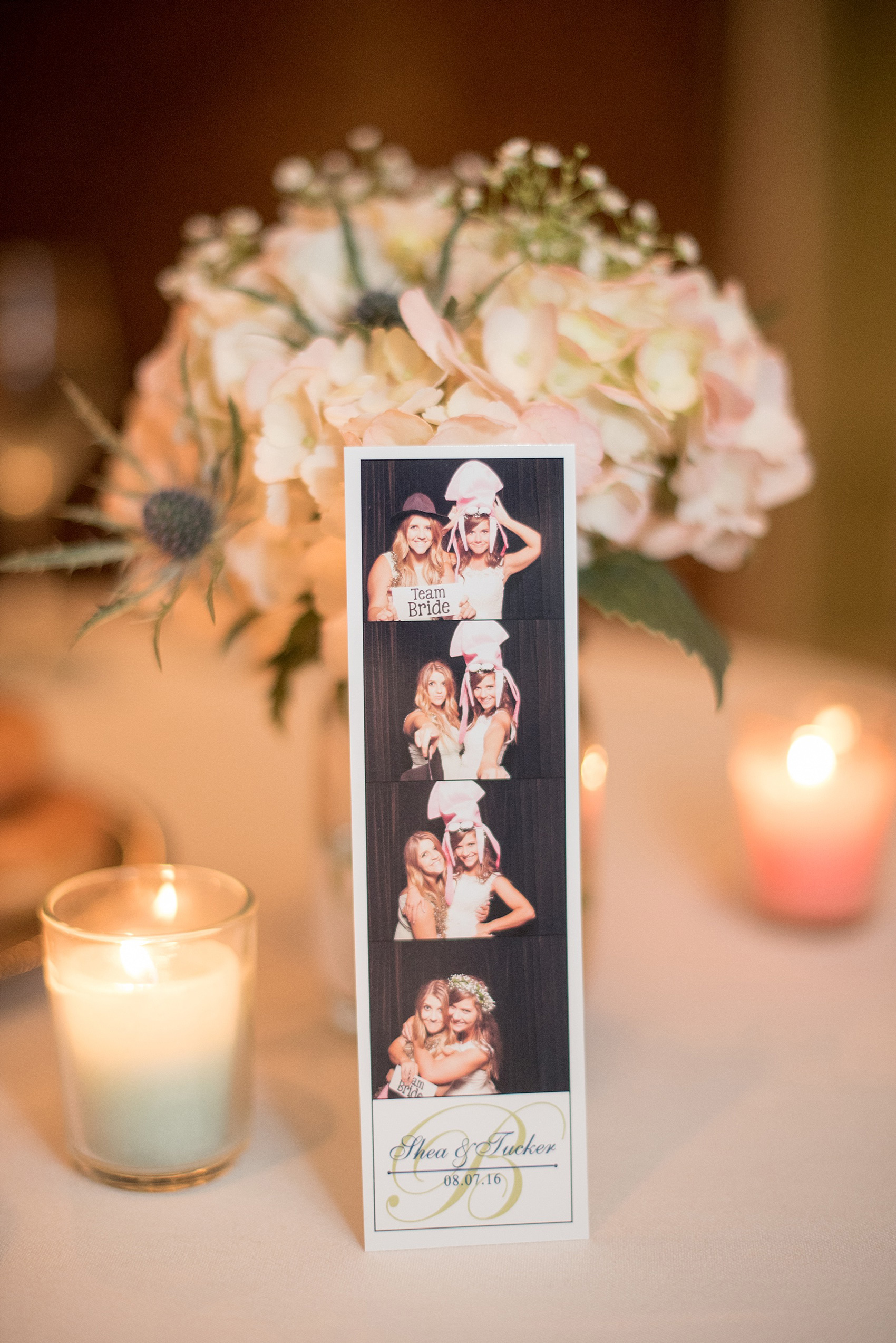 Mikkel Paige Photography photo of a Top of the Hill reception in Chapel Hill, NC with a photobooth strip.