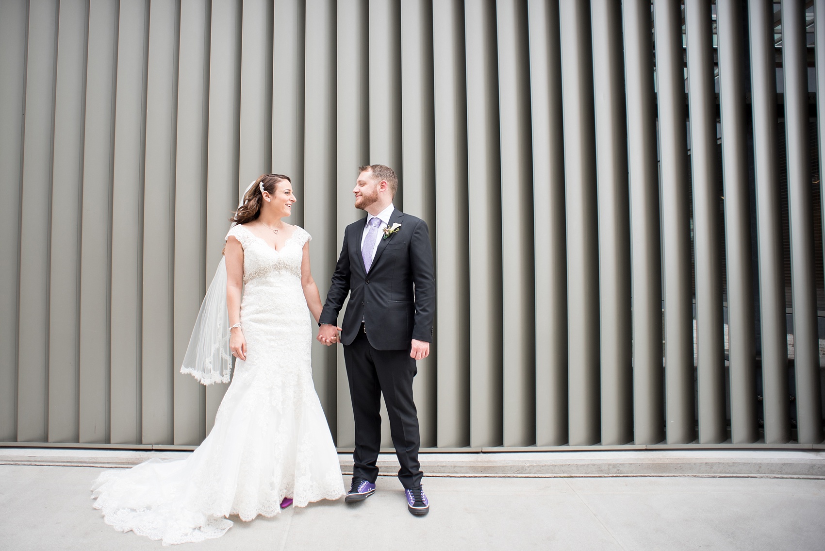 Mikkel Paige Photography photos of a NYC wedding at Tribeca Rooftop. The bride bride and groom in an urban image on the streets of lower Manhattan.