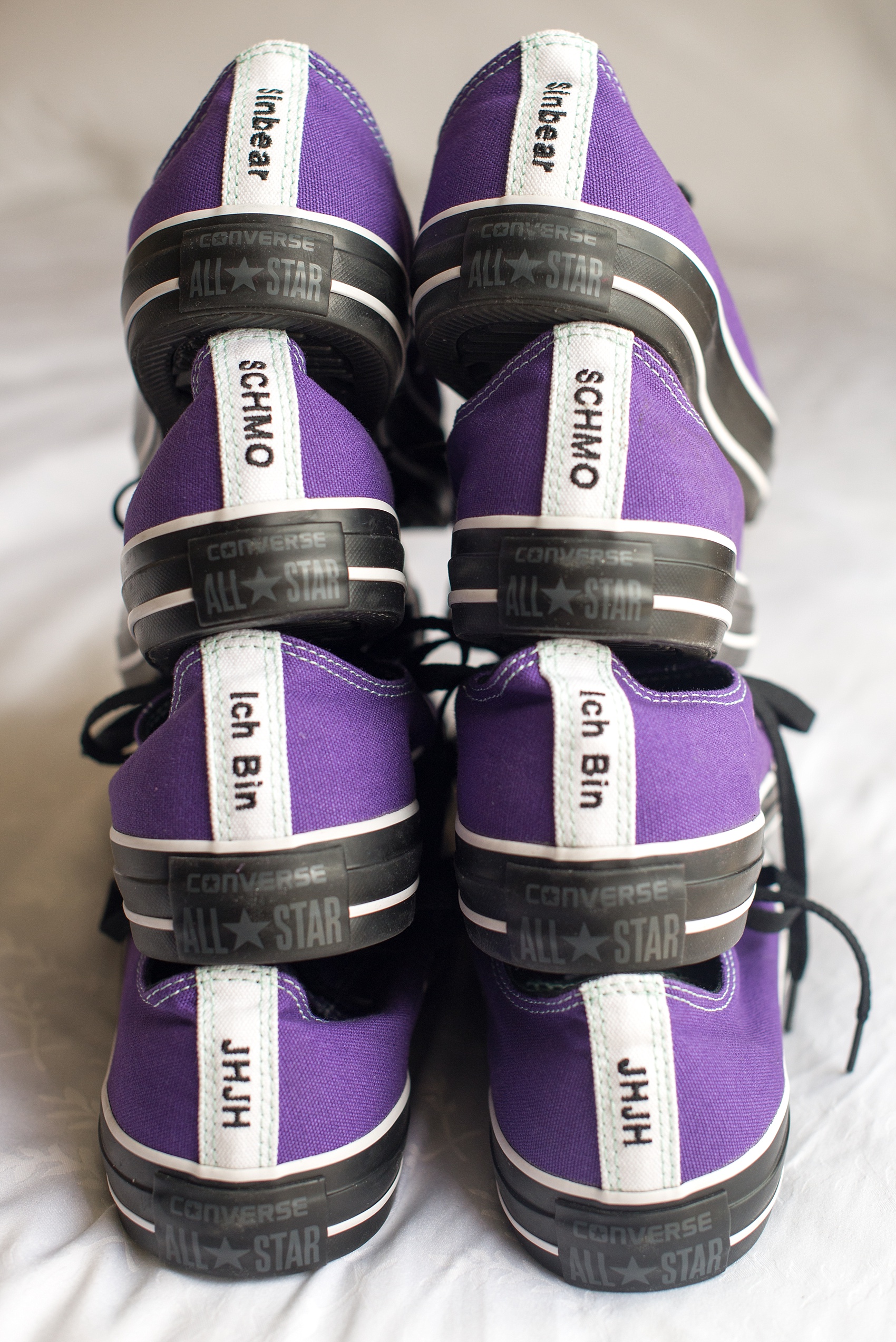 Mikkel Paige Photography photos of a NYC wedding at Tribeca Rooftop. Custom Converse for the groomsmen!