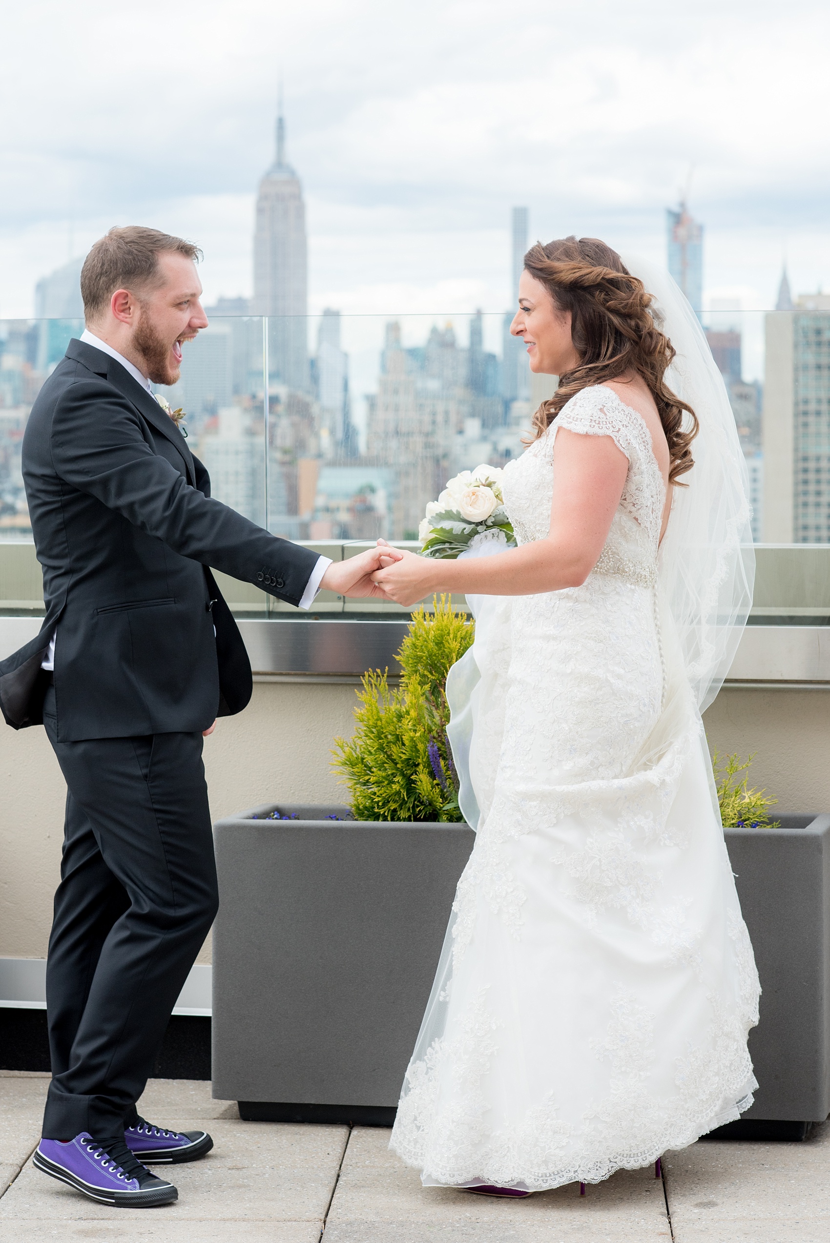 Mikkel Paige Photography photos of a NYC wedding at Tribeca Rooftop. First look with the Manhattan Skyline.