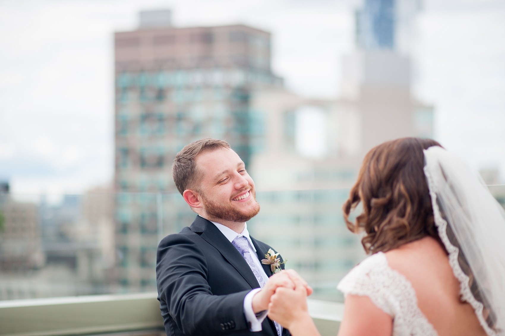 Mikkel Paige Photography photos of a NYC wedding at Tribeca Rooftop. First look with the Manhattan Skyline.