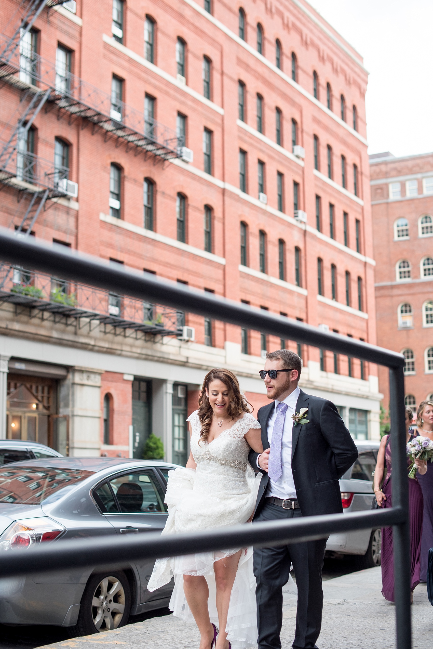 Mikkel Paige Photography photos of a NYC wedding at Tribeca Rooftop. An urban image of the bride and groom on the streets of New York.