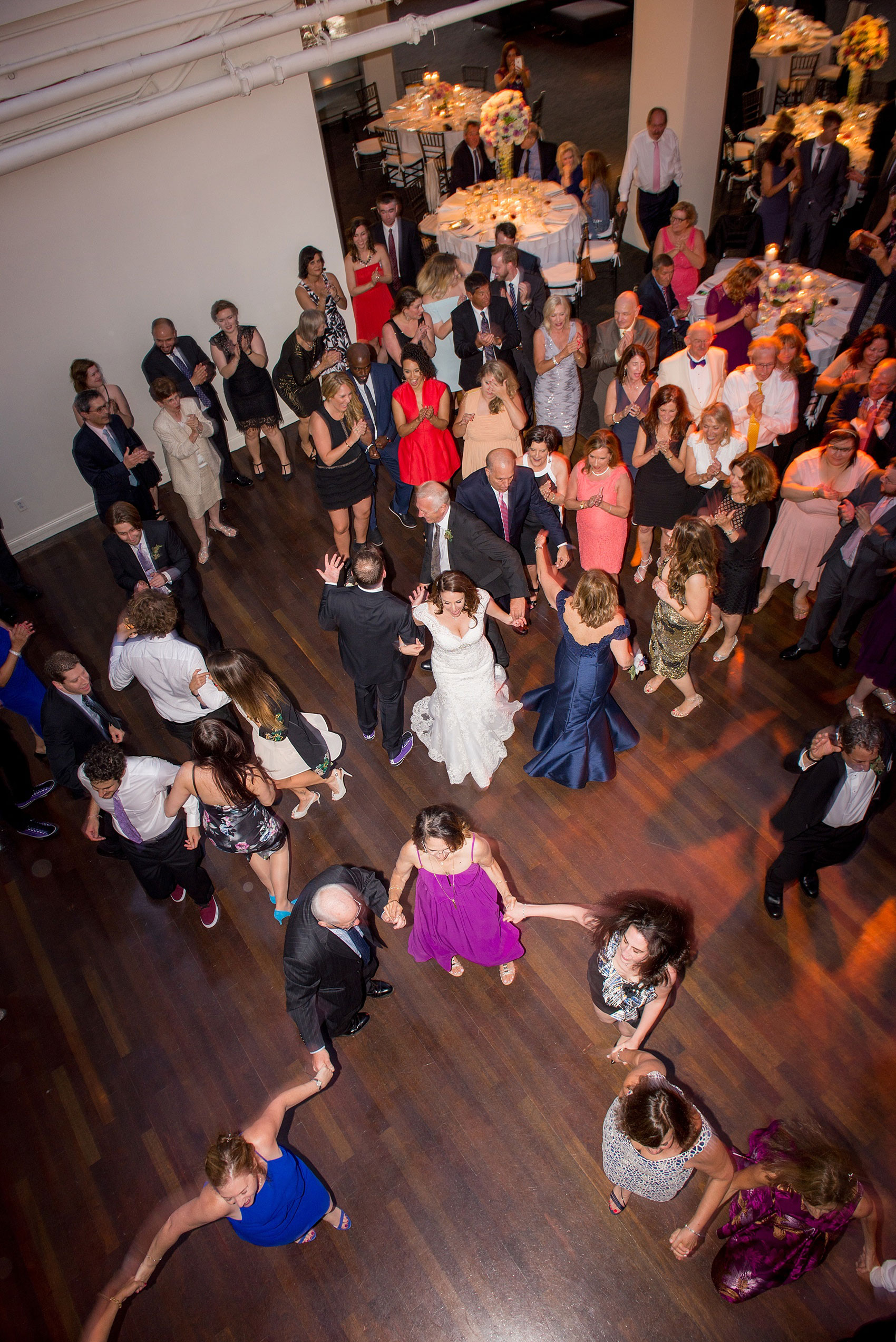 Mikkel Paige Photography photos of a NYC wedding at Tribeca Rooftop. An image of the reception.