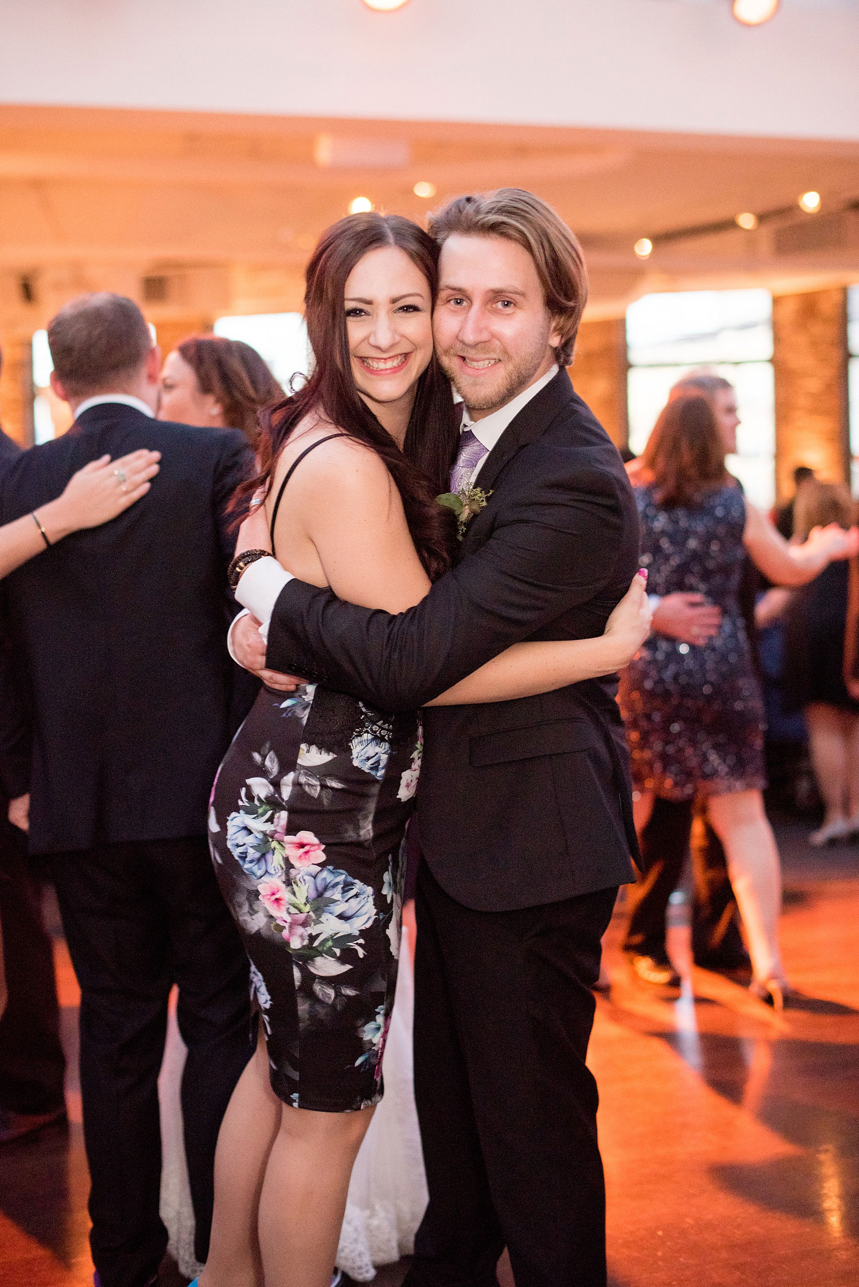 Mikkel Paige Photography photos of a NYC wedding at Tribeca Rooftop. An image of a couple at the reception.