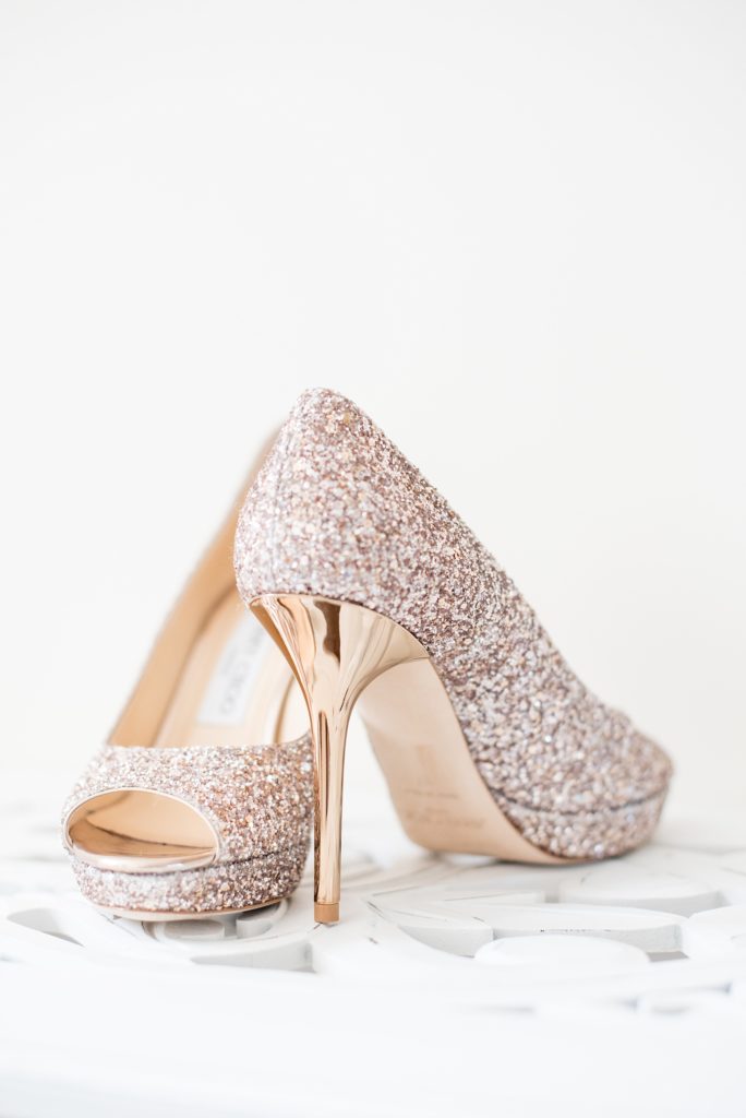 Mikkel Paige Photography photos from a Bay Head Yacht Club wedding in NJ. The bride wore gold glitter metallic heels by Jimmy Choo.