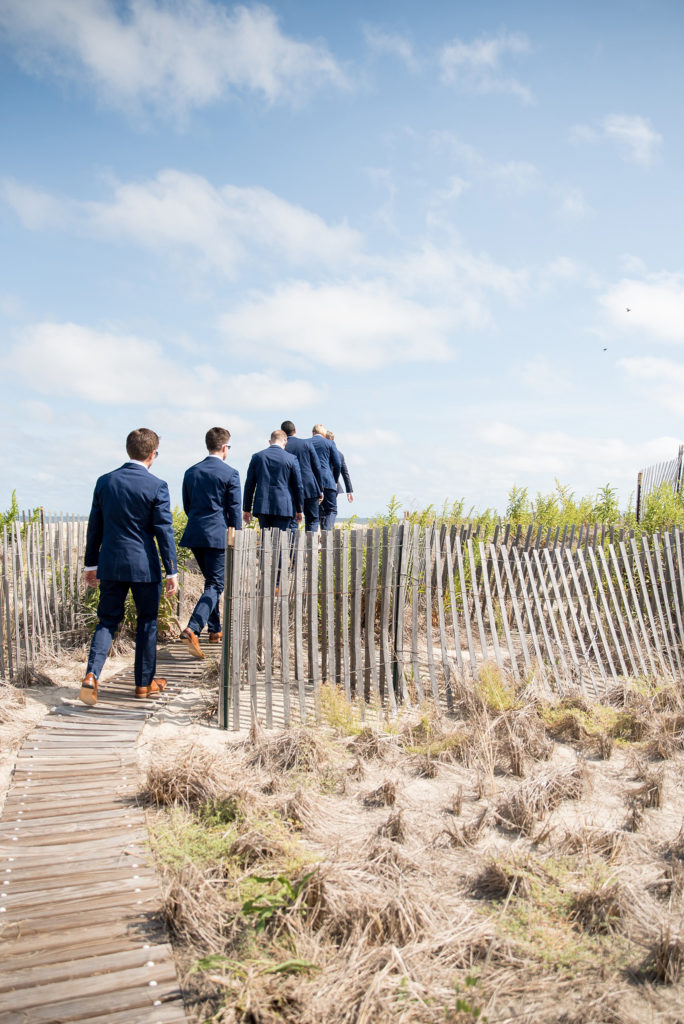 Mikkel Paige Photography photos from a Bay Head wedding in NJ. The groomsmen head to the beach for a nautical themed day at the yacht club.