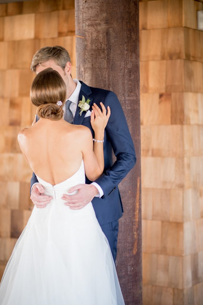 Mikkel Paige Photography photos of a Bay Head Yacht Club nautical wedding. The bride wore a white low back gown with lace and white sequins from Kleinfeld bridal.