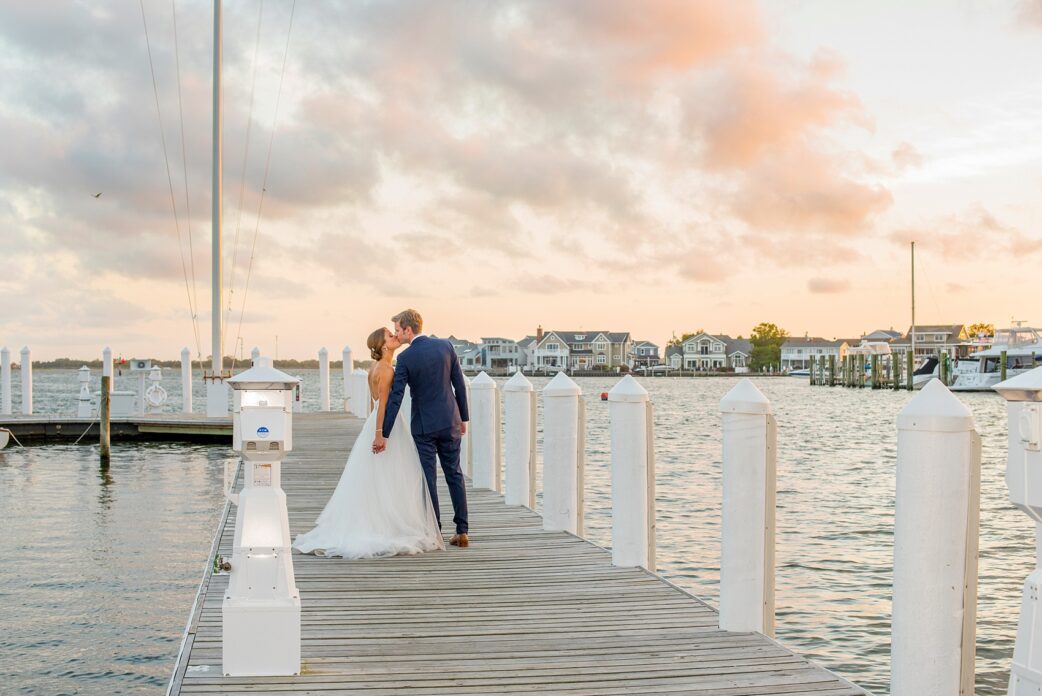 Mikkel Paige Photography sunset bride and groom photo at a wedding at Bay Head Yacht Club on the water in New Jersey.