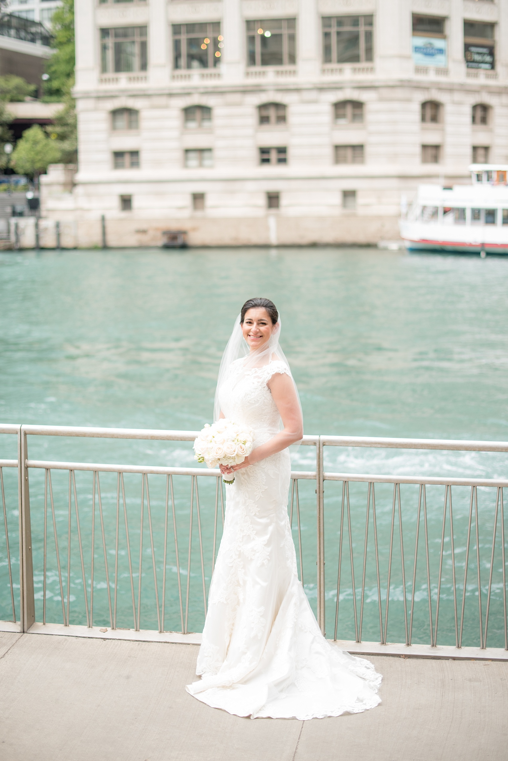 Mikkel Paige Photography photo of the bride on the Riverwalk downtown Chicago.