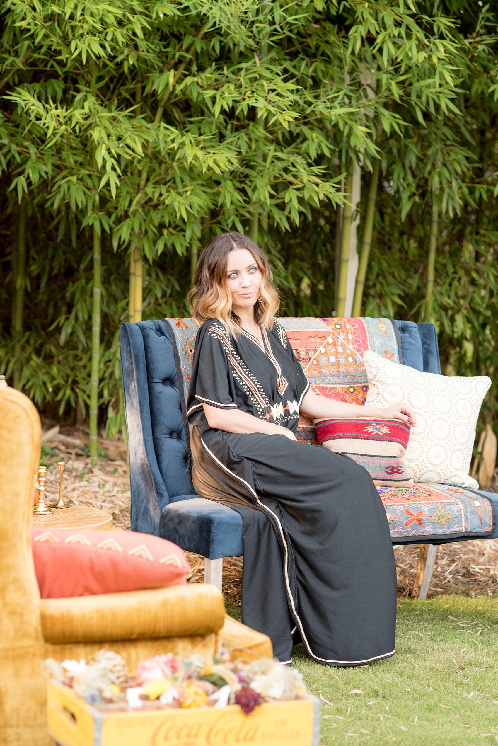 Mikkel Paige Photography photo of Moroccan themed party with vintage furniture and festive attire.