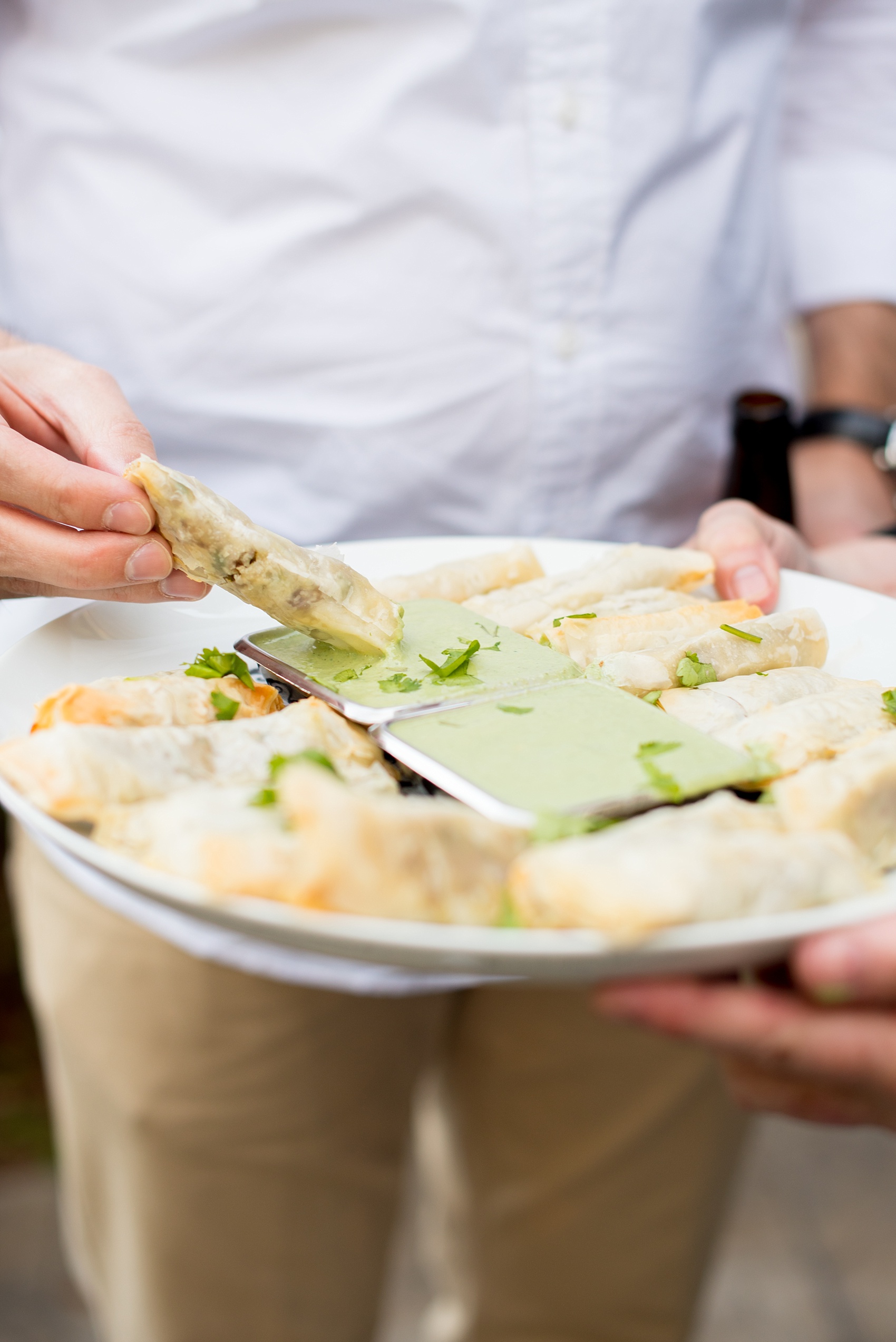 Mikkel Paige Photography photo of Moroccan themed party with mint lamb rollups hors d'oeuvres.