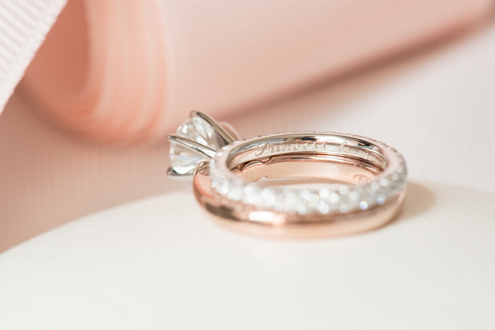 Mikkel Paige Photography photos of a luxury wedding in NYC. Ring detail image with "Princess" engraved inside the bride's diamond eternity band.