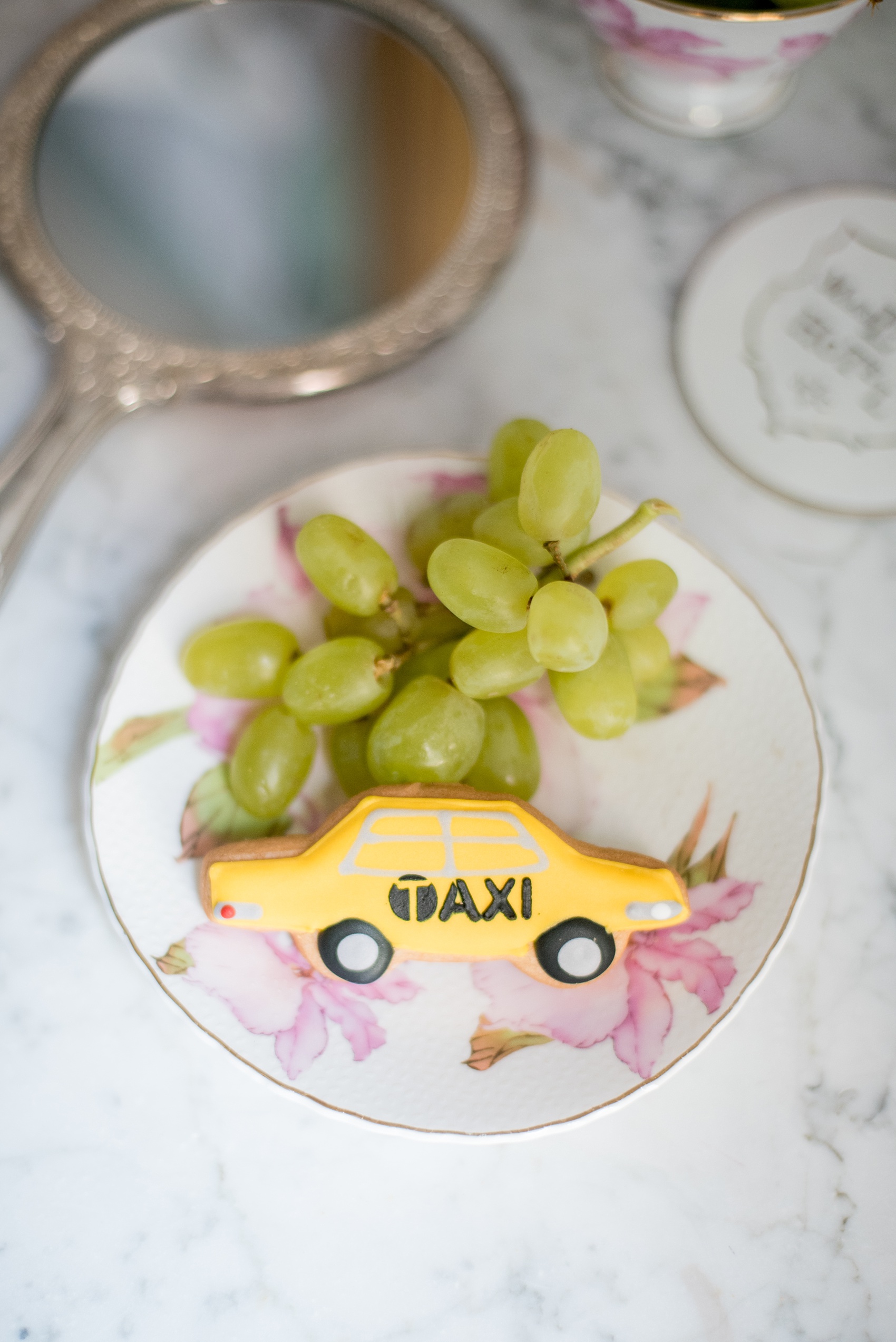 Mikkel Paige Photography photos of a luxury wedding in NYC. Image of a guest favor taxi cab cookie from Eleni's cookies at The Marlton Hotel.