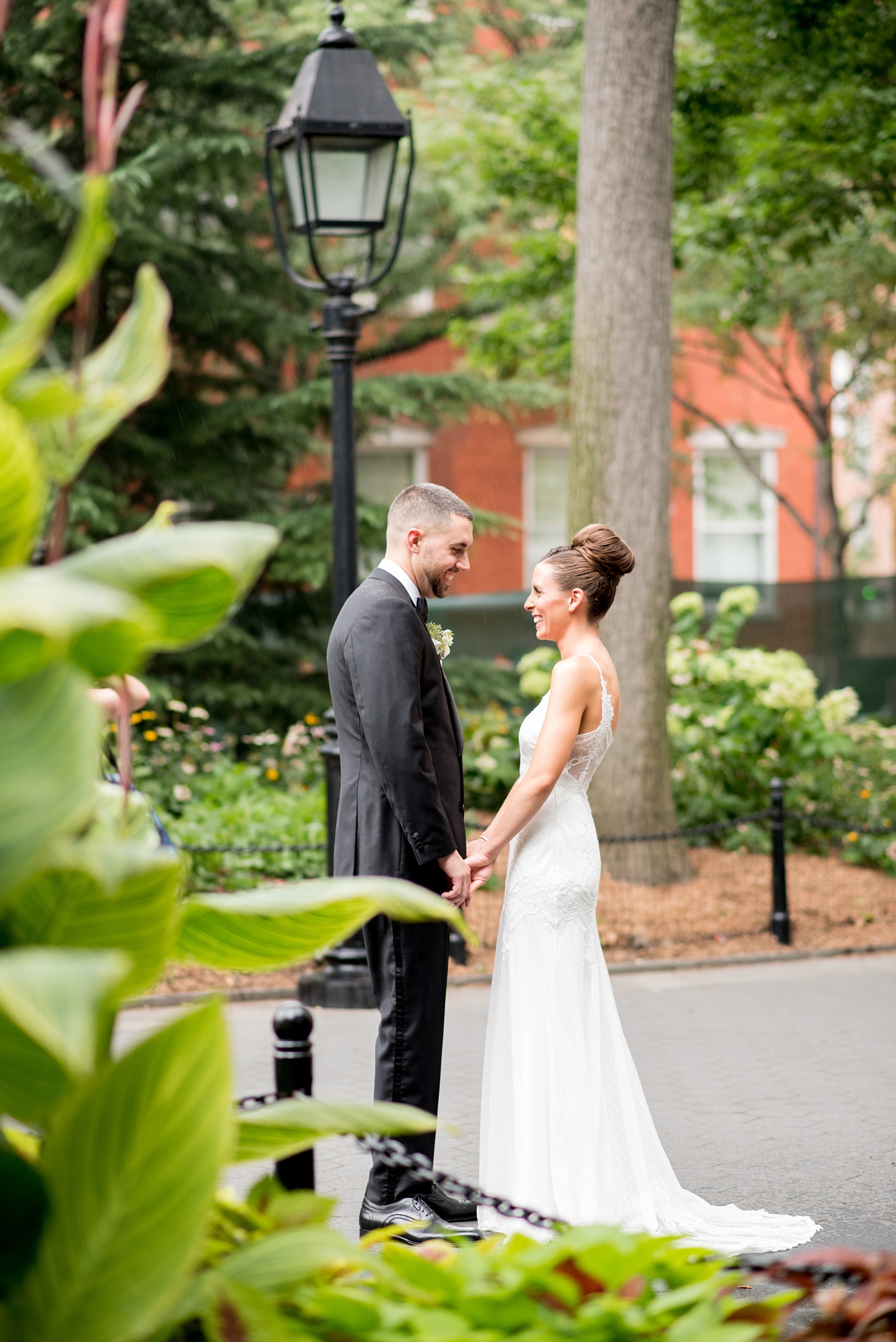 Mikkel Paige Photography photos of a luxury wedding in NYC. Image of the bride and groom in Washington Square Park.